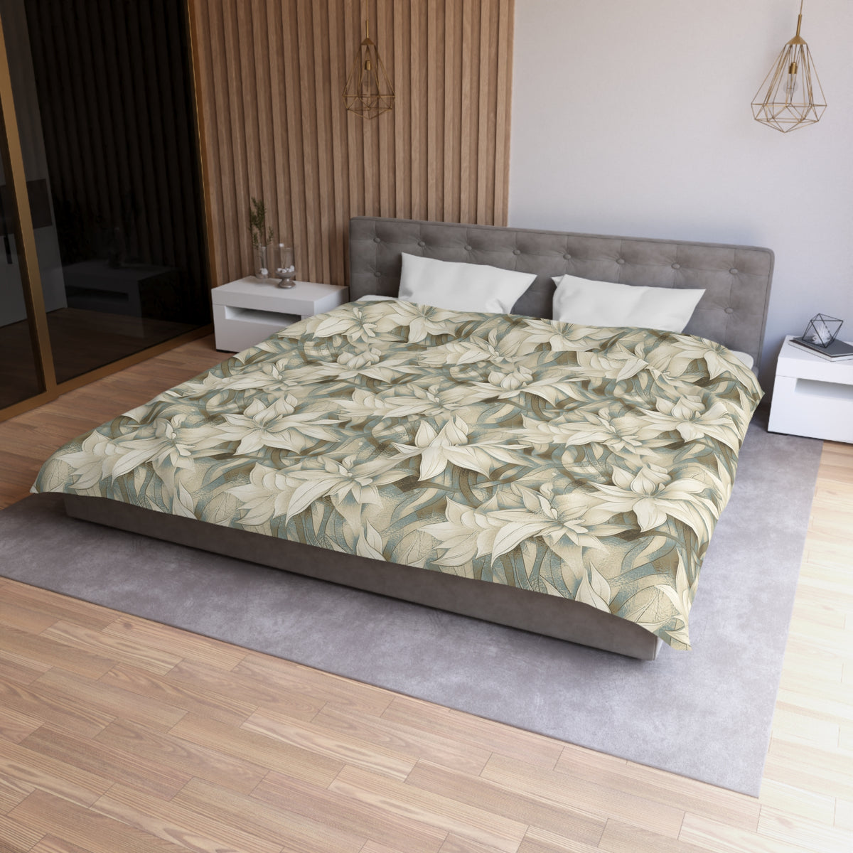 a modern bedroom with a large bed, a gray headboard, and a wooden wall. The bed is covered in a floral print comforter, and there are two white pillows on the bed. The room has a wooden floor and a gray area rug.