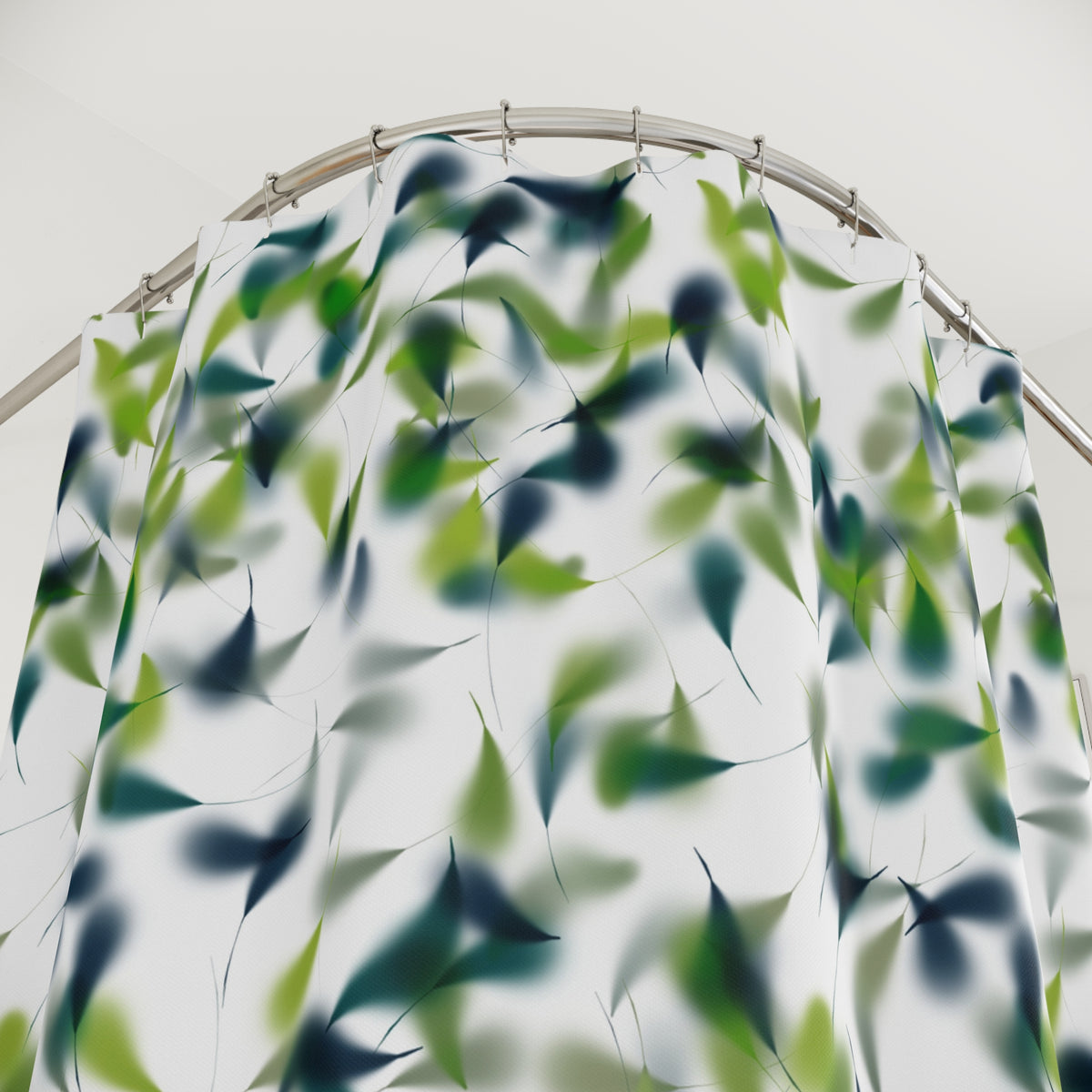 a shower curtain with a leafy green and blue abstract pattern.