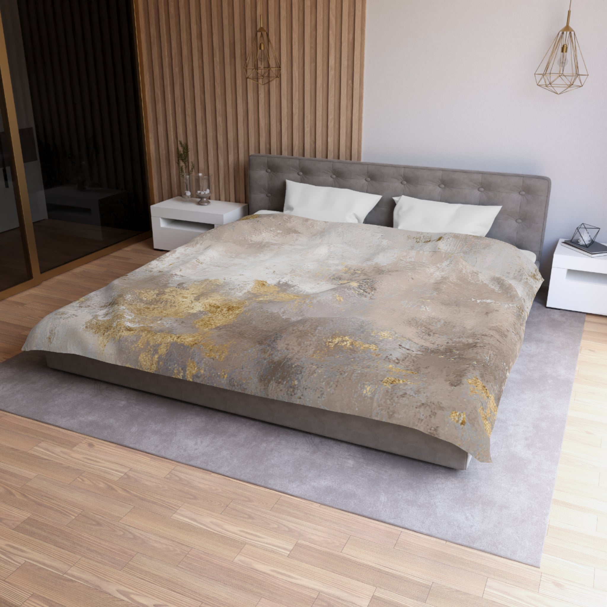 a modern bedroom with a large bed, a gray headboard, and a wooden wall. The bed is covered with a gray and gold patterned comforter, and there are two white pillows on the bed. The room has a wooden floor and a gray area rug. There are two nightstands on either side of the bed, and a pendant light hangs above the bed.