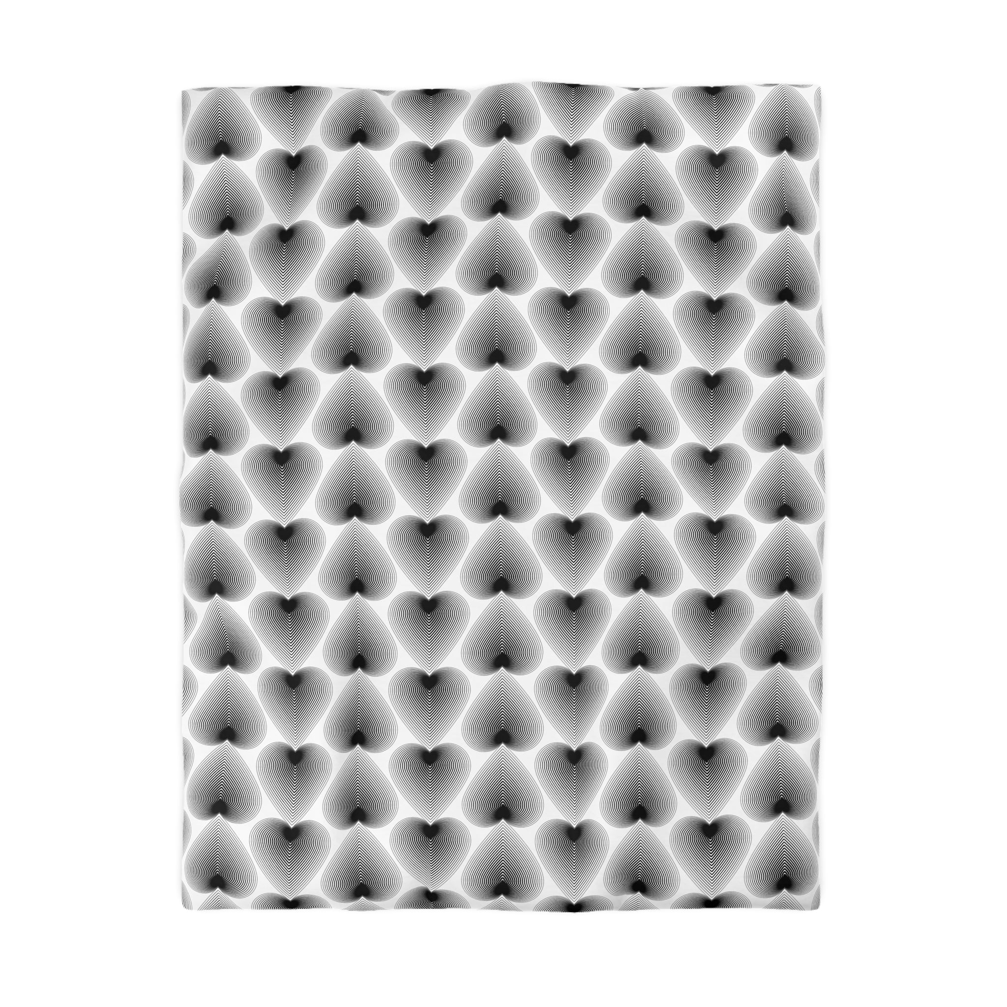 a repeating pattern of black and white hearts arranged in a grid-like fashion.