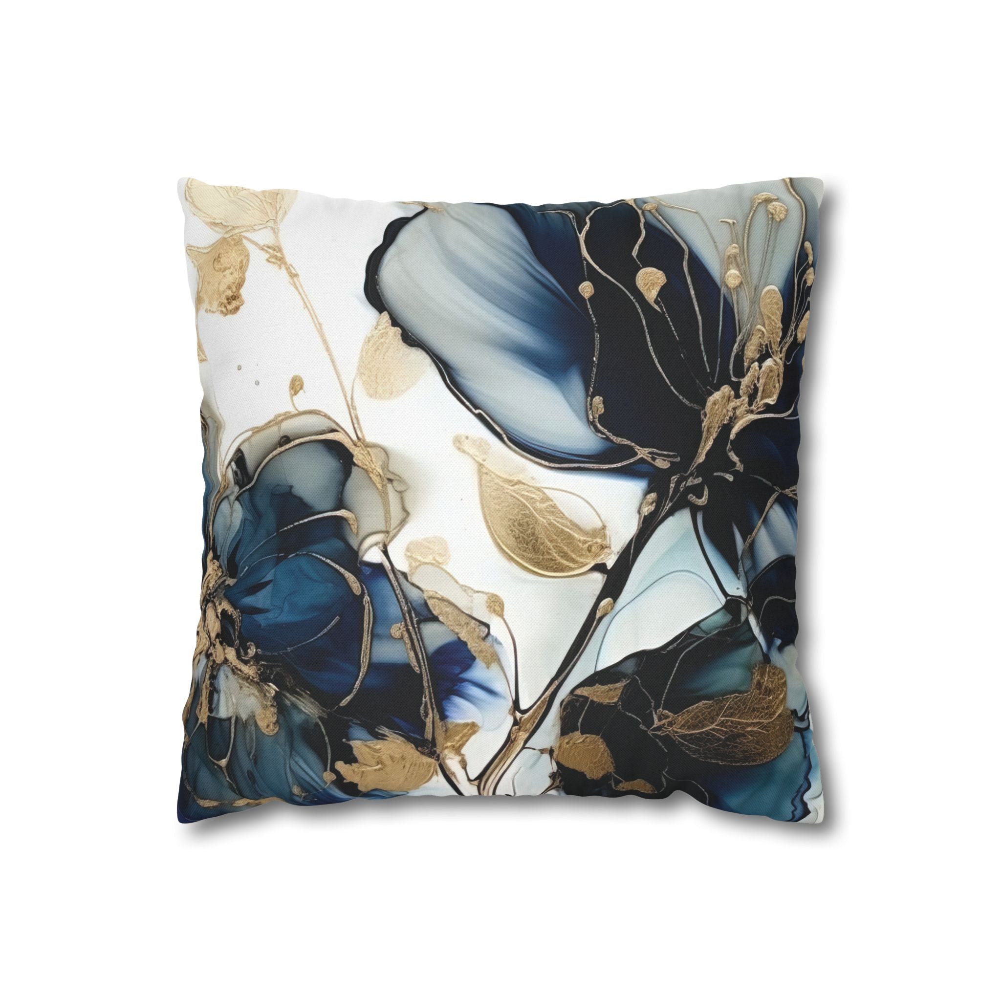 a square pillow with a floral pattern in shades of blue and gold.