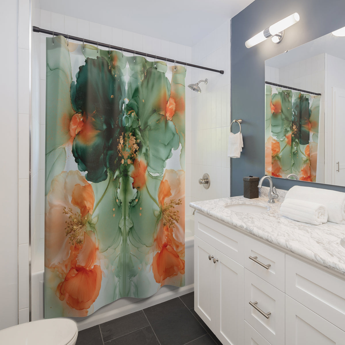 A modern bathroom with a white vanity, a large green and orange floral shower curtain, and a mirror above the sink.