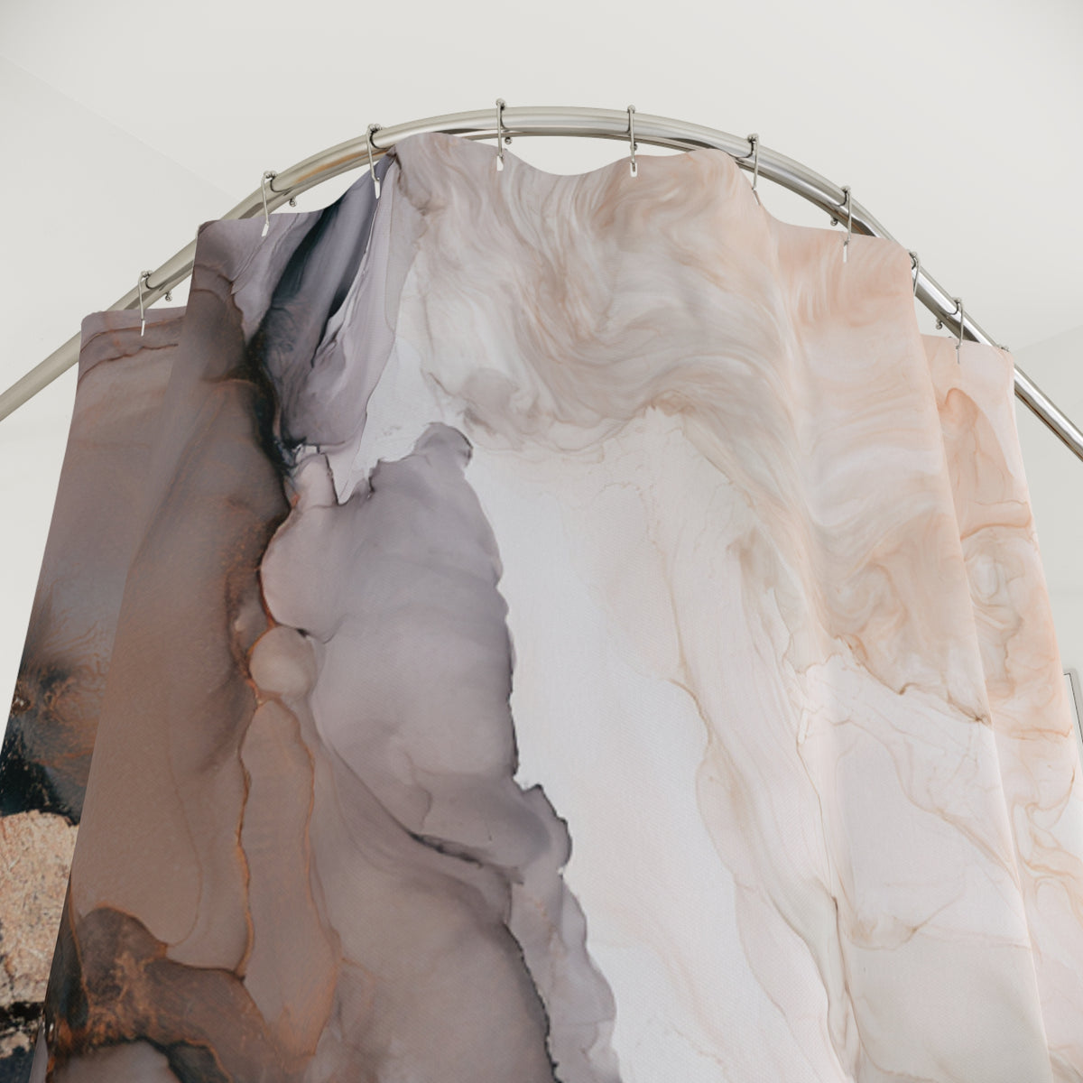 a shower curtain with a marble-like abstract pattern in shades of brown and beige.