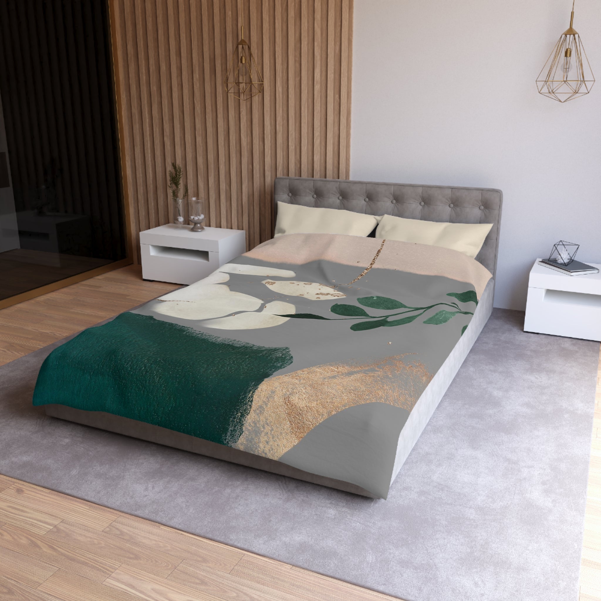a modern bedroom with a gray tufted headboard, a green and gold abstract patterned bedspread, and white nightstands on either side of the bed.