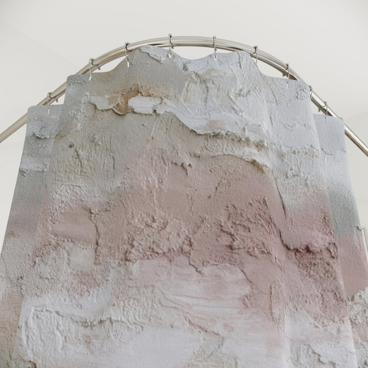 a close-up view of a textured, textured surface with a gradient of colors, including shades of pink, white, and beige.