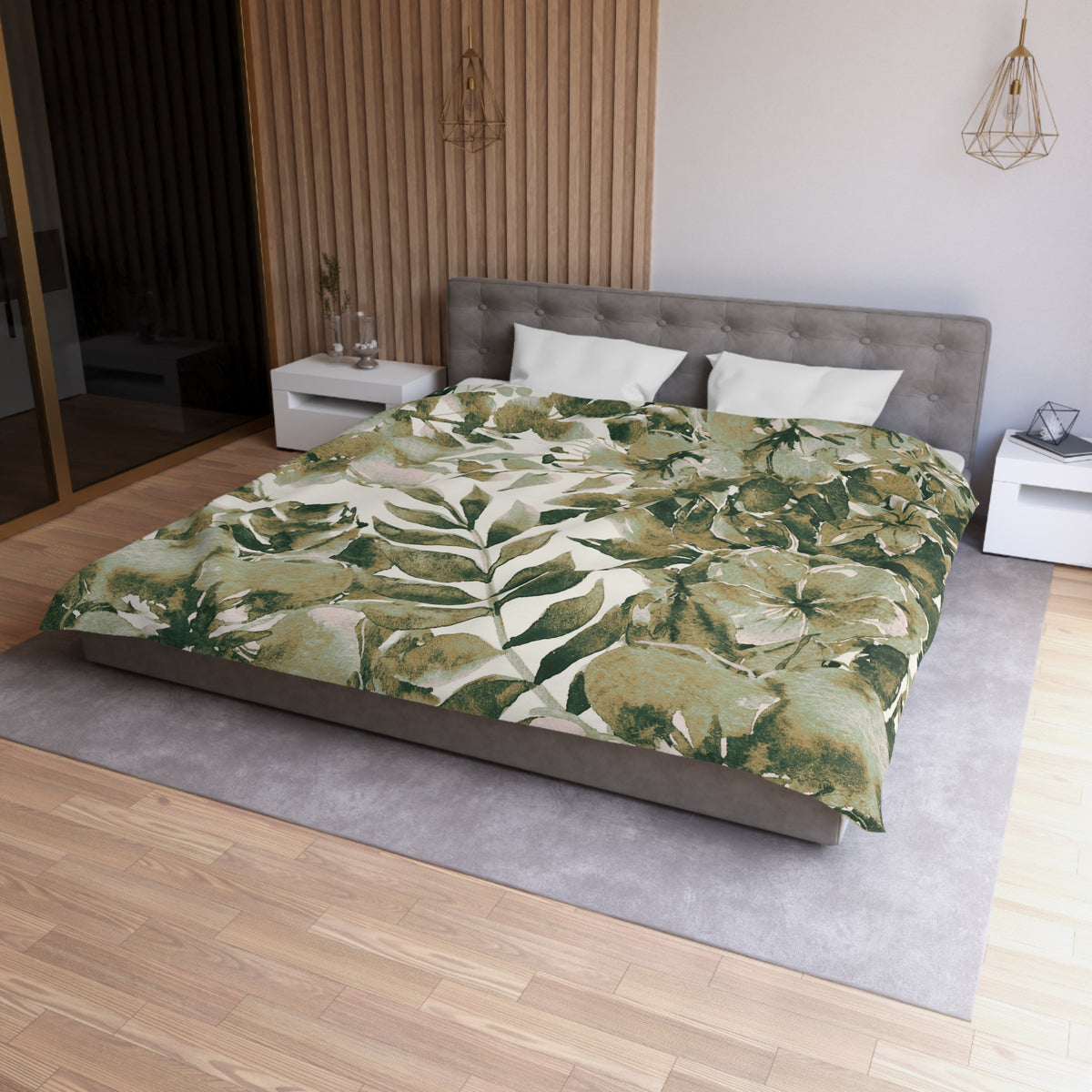 a modern bedroom with a large bed covered in a green leafy patterned comforter. The bed is positioned against a wall with a wooden panel design. The room also features a nightstand, a pendant light, and a mirror.