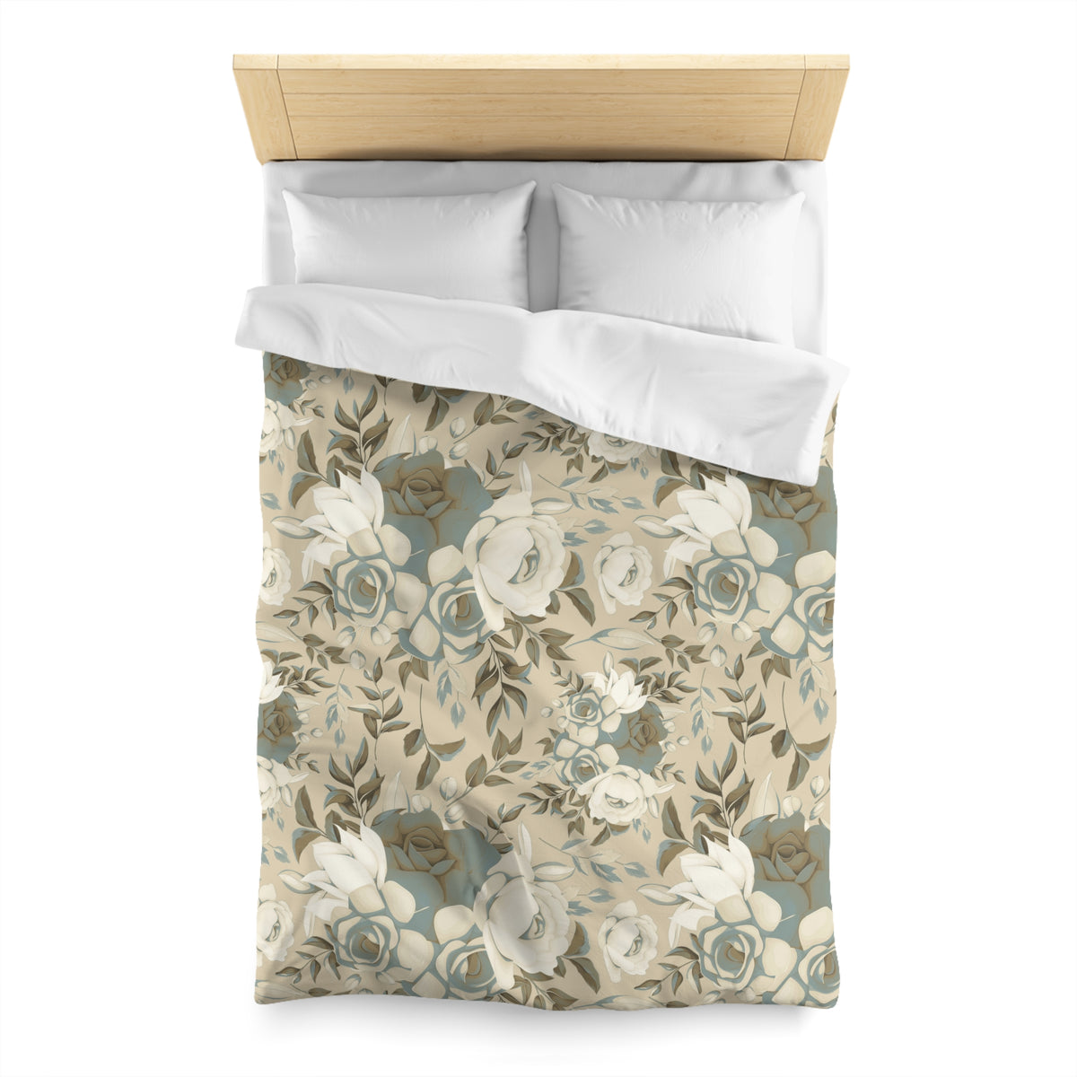 a neatly made bed with a floral patterned comforter and pillows.