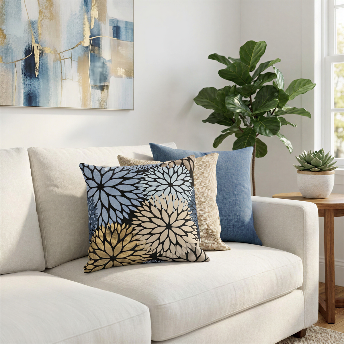 a cozy living room with a white sofa adorned with colorful throw pillows. The room is decorated with a painting on the wall, a potted plant, and a wooden side table.