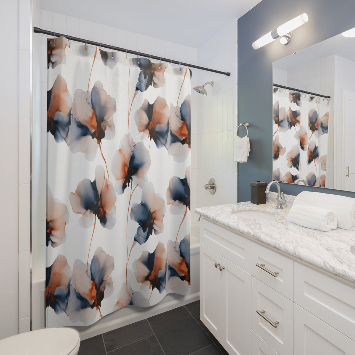 a modern bathroom with a white vanity, a shower curtain with a floral pattern, and a mirror above the vanity.