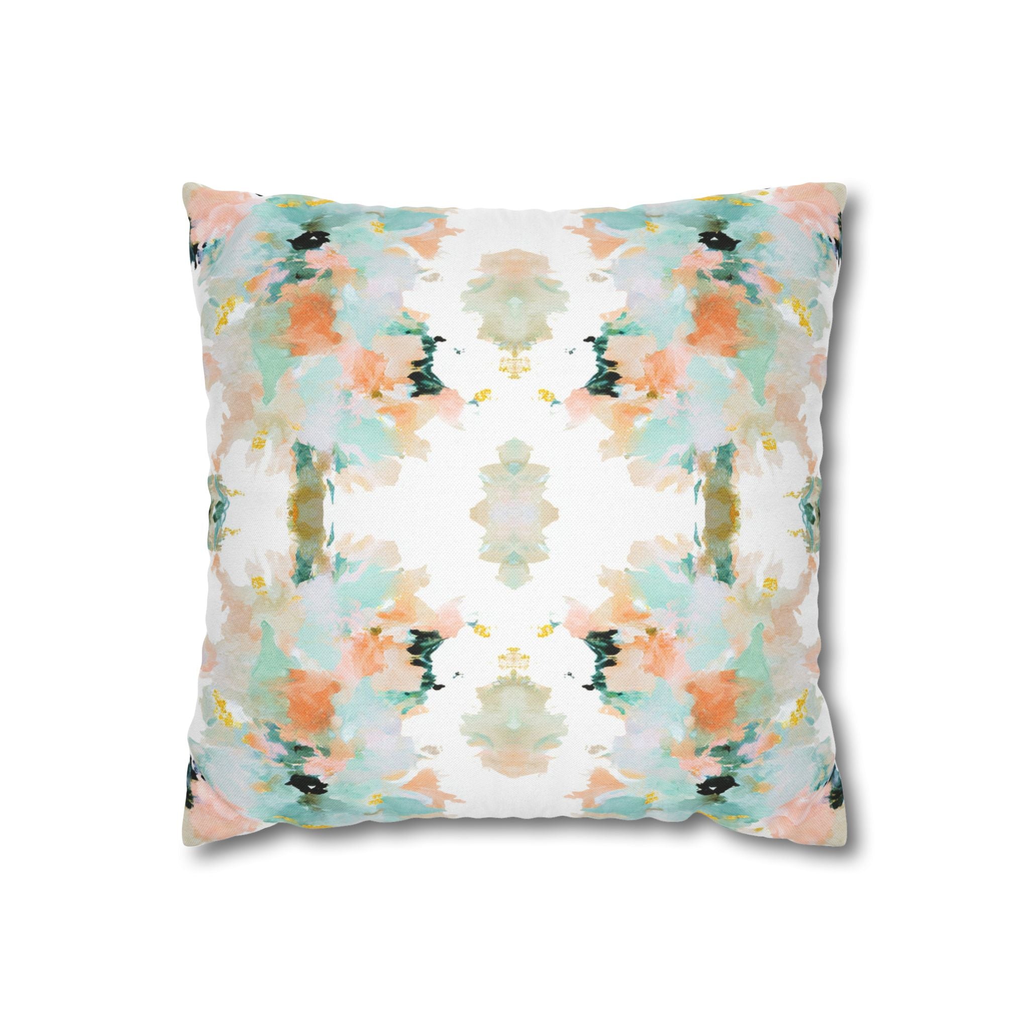a square pillow with a vibrant abstract pattern in shades of green, orange, and white.