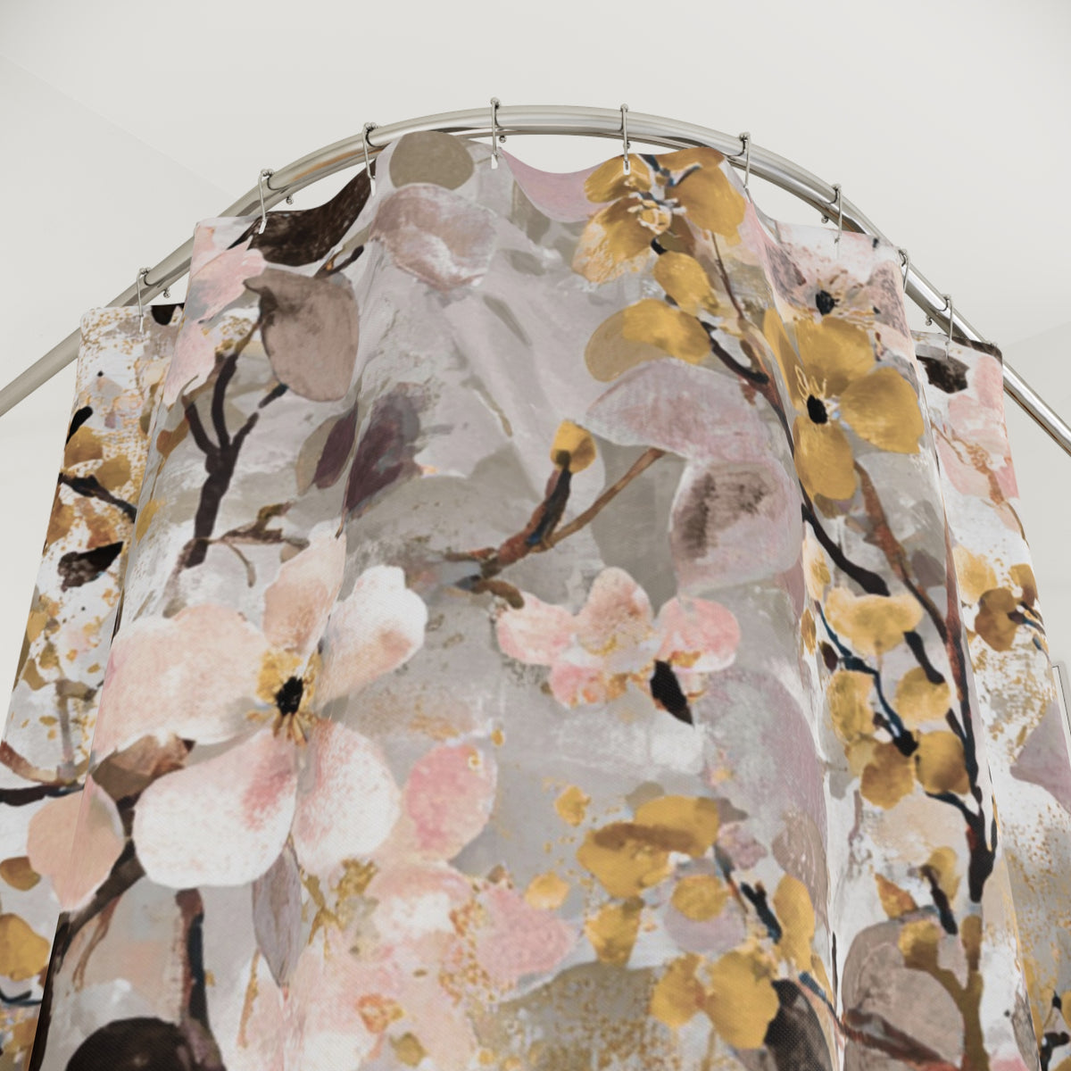 a shower curtain with a floral print in shades of pink, yellow, and brown.