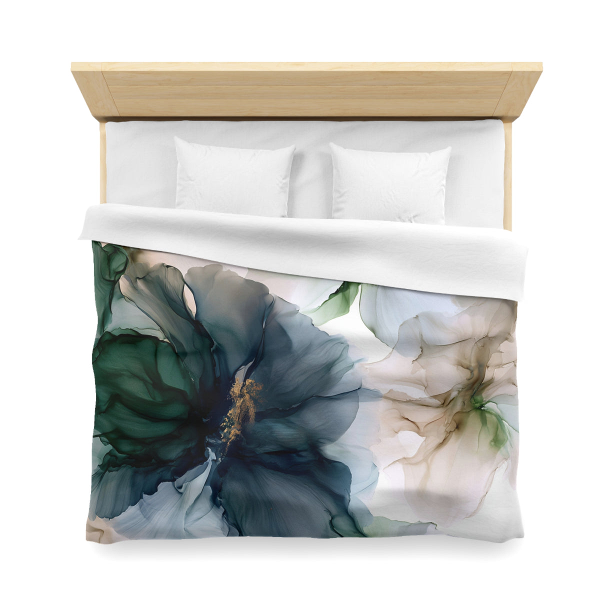 a bed with a white and blue flower on it