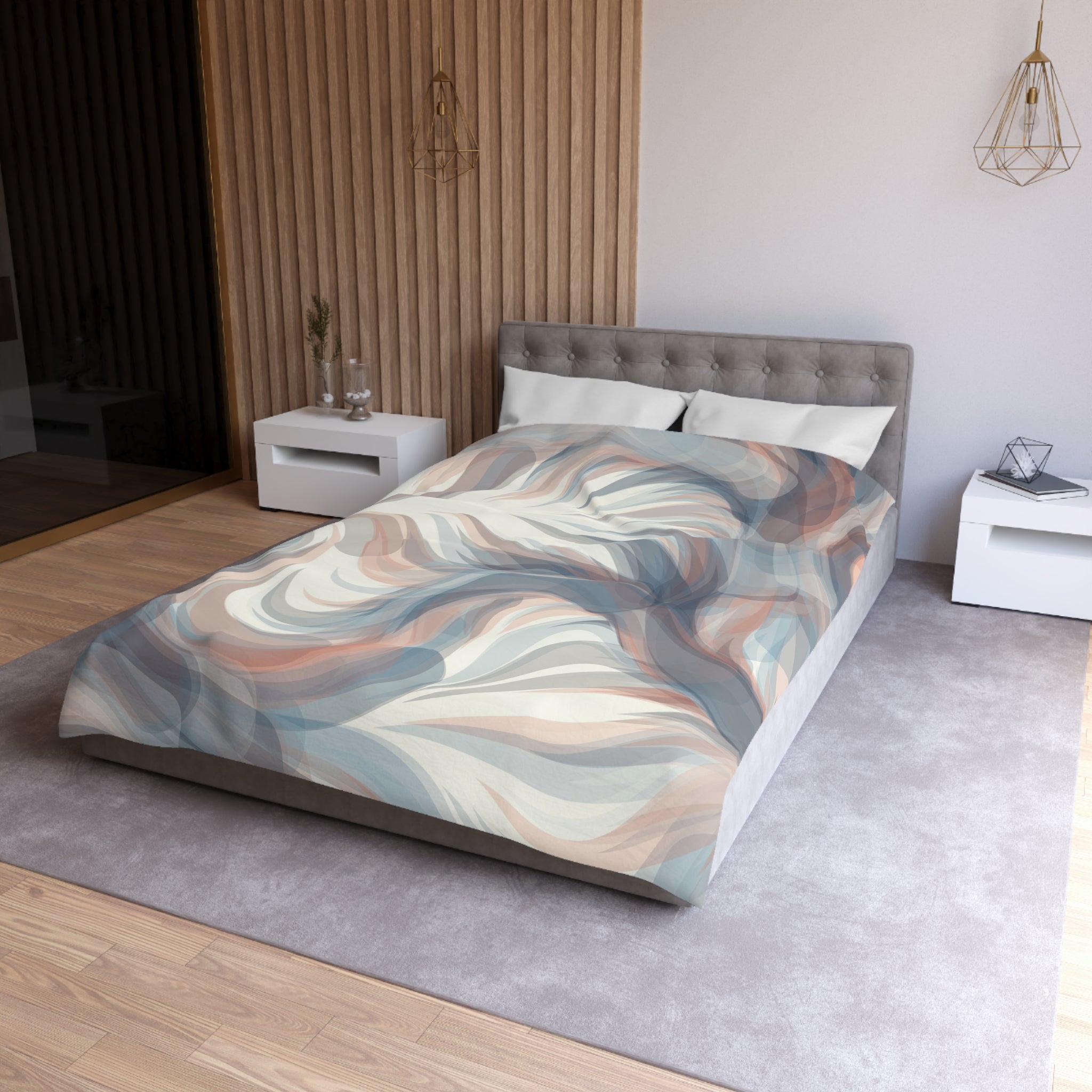 a modern bedroom with a large bed, a gray headboard, and a colorful abstract patterned bedspread. The room has a neutral color scheme with white walls and a wooden floor. There are two nightstands on either side of the bed, and a pendant light hangs above it.