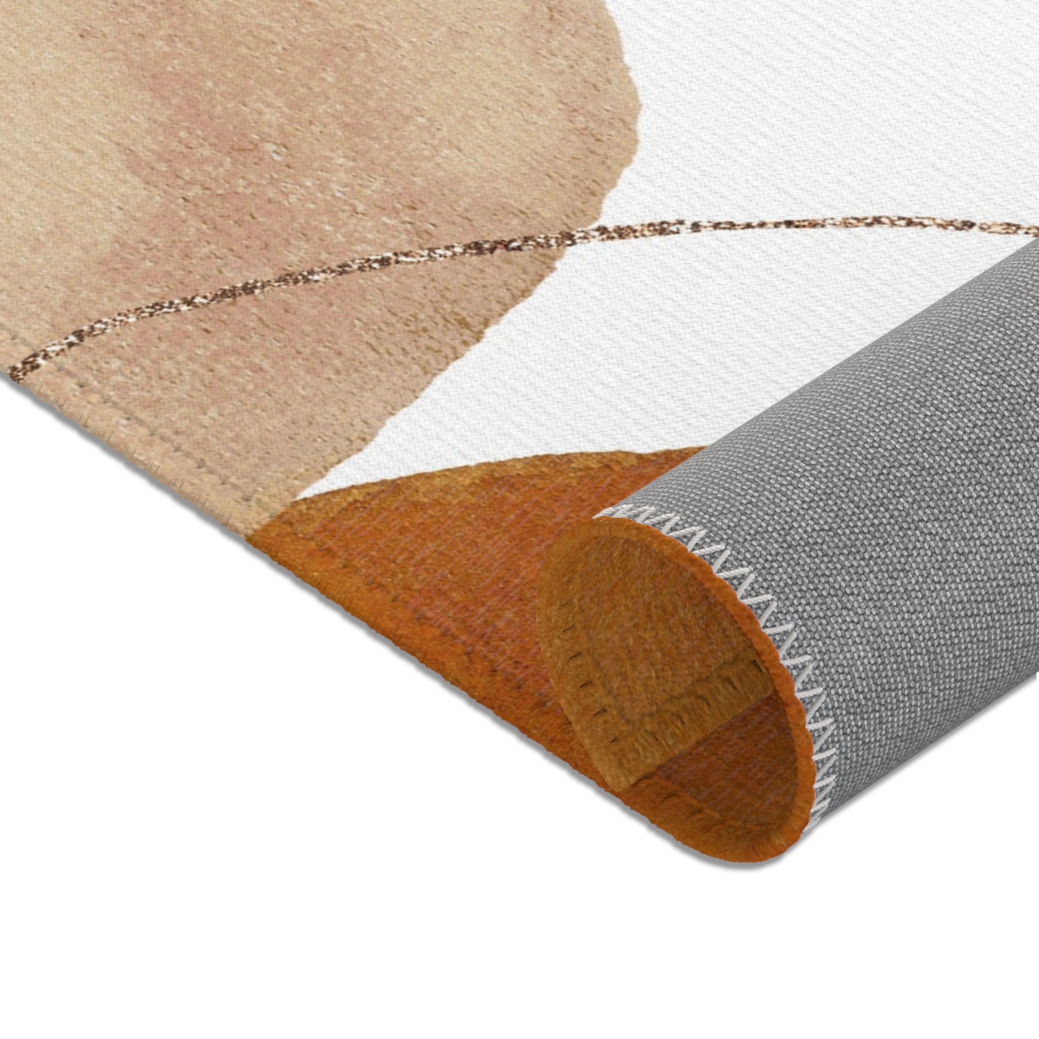 Modern rust, beige and blush pink abstract area rug in a bright contemporary interior