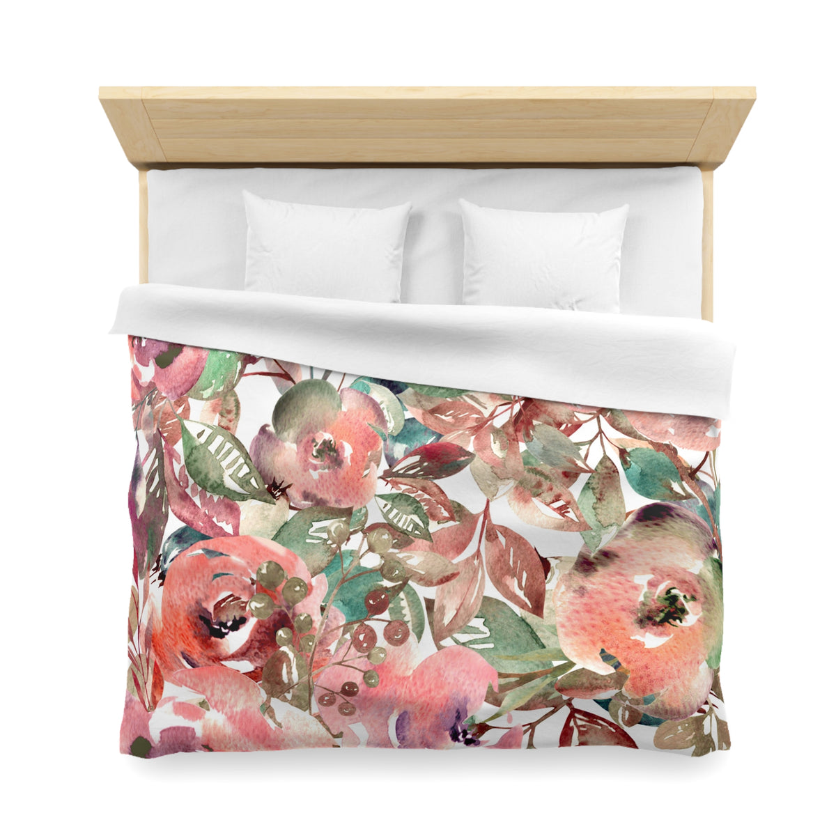 a bed with a floral print duvet cover featuring a variety of colorful flowers and leaves.