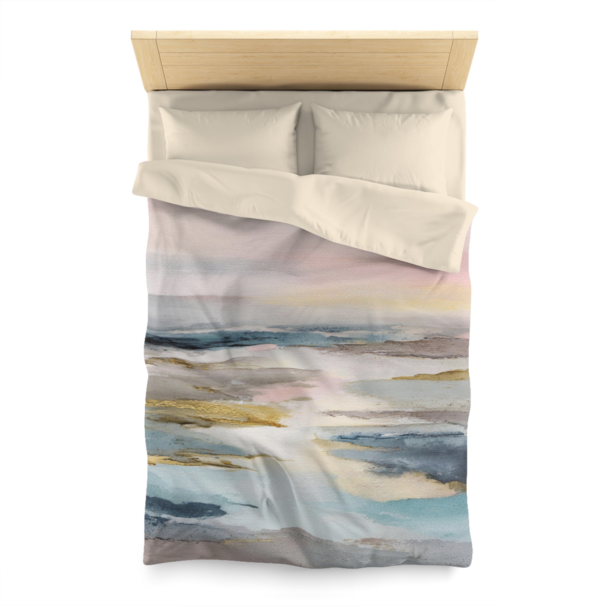 a bed with a colorful, abstract painting or print on the comforter and pillows.