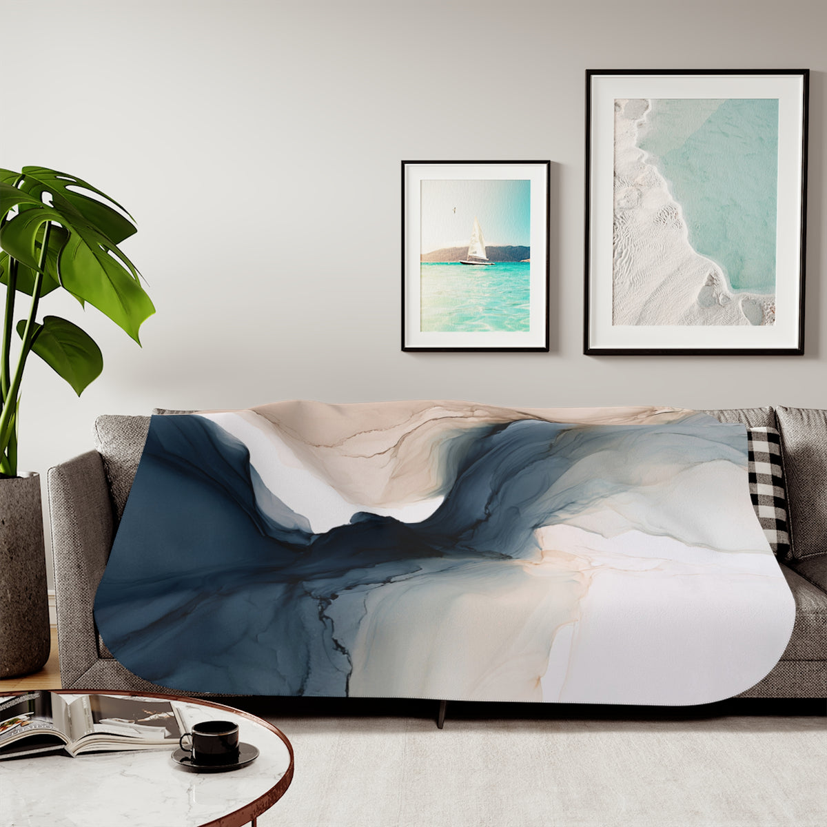 a living room with a couch covered in a blanket