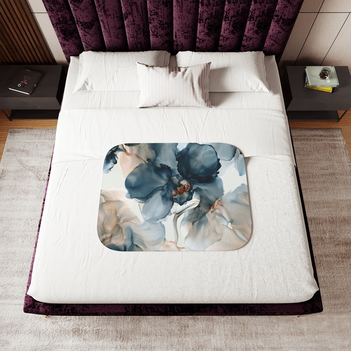 a bed with a purple headboard and white sheets