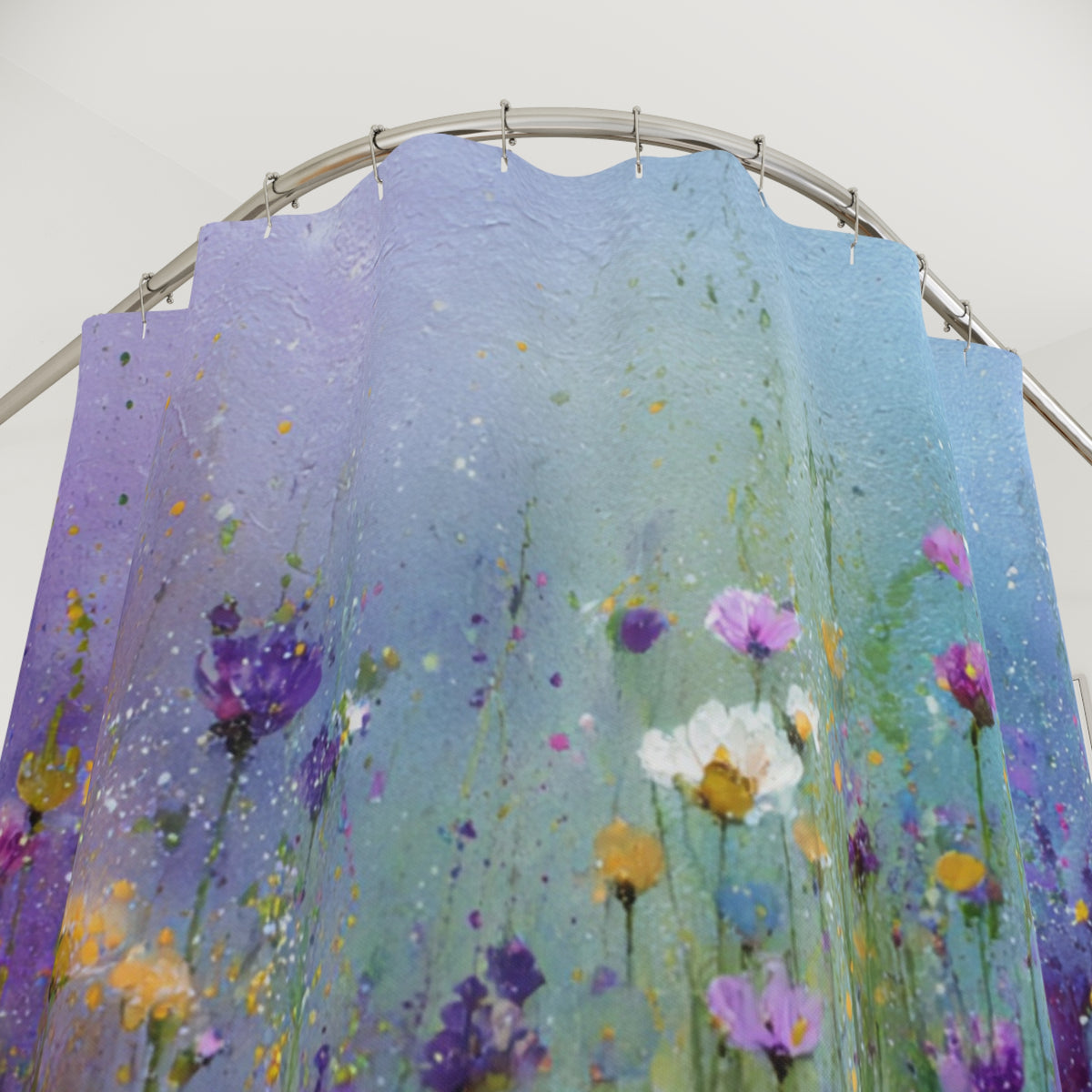 a vibrant, colorful shower curtain with a floral pattern. The curtain is hanging from a metal rod, and it appears to be a large, eye-catching piece of art.