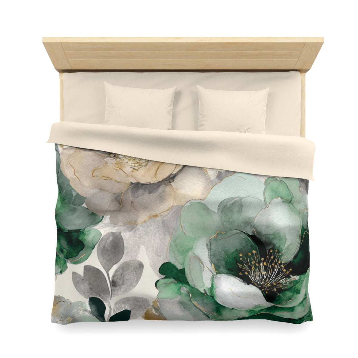 a bed with a floral print duvet cover featuring a combination of green and gray colors, along with gold accents.