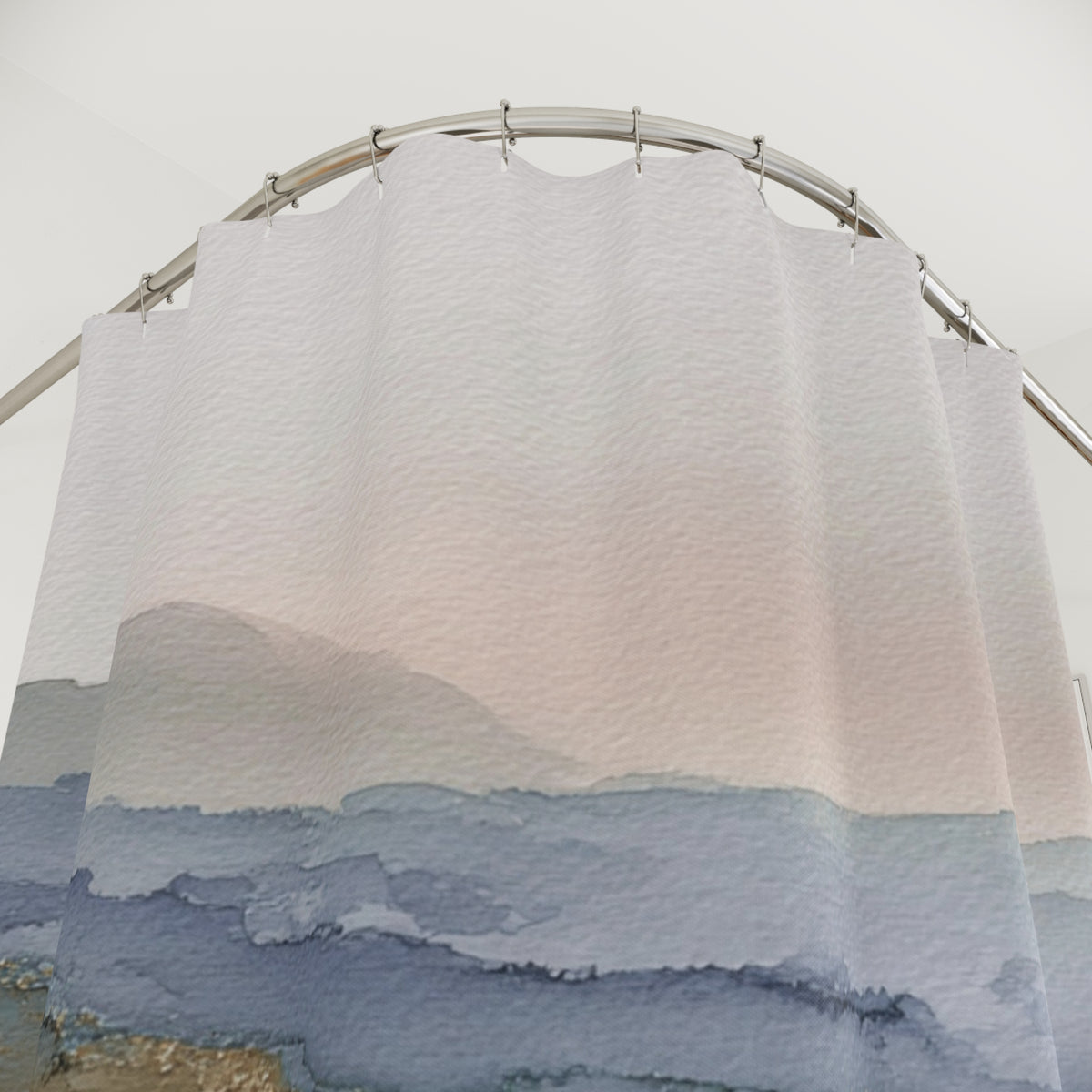 a shower curtain with a watercolor painting of a mountain landscape.