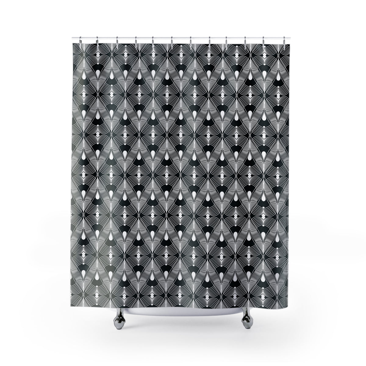 a shower curtain with a repeating geometric pattern in black and white.