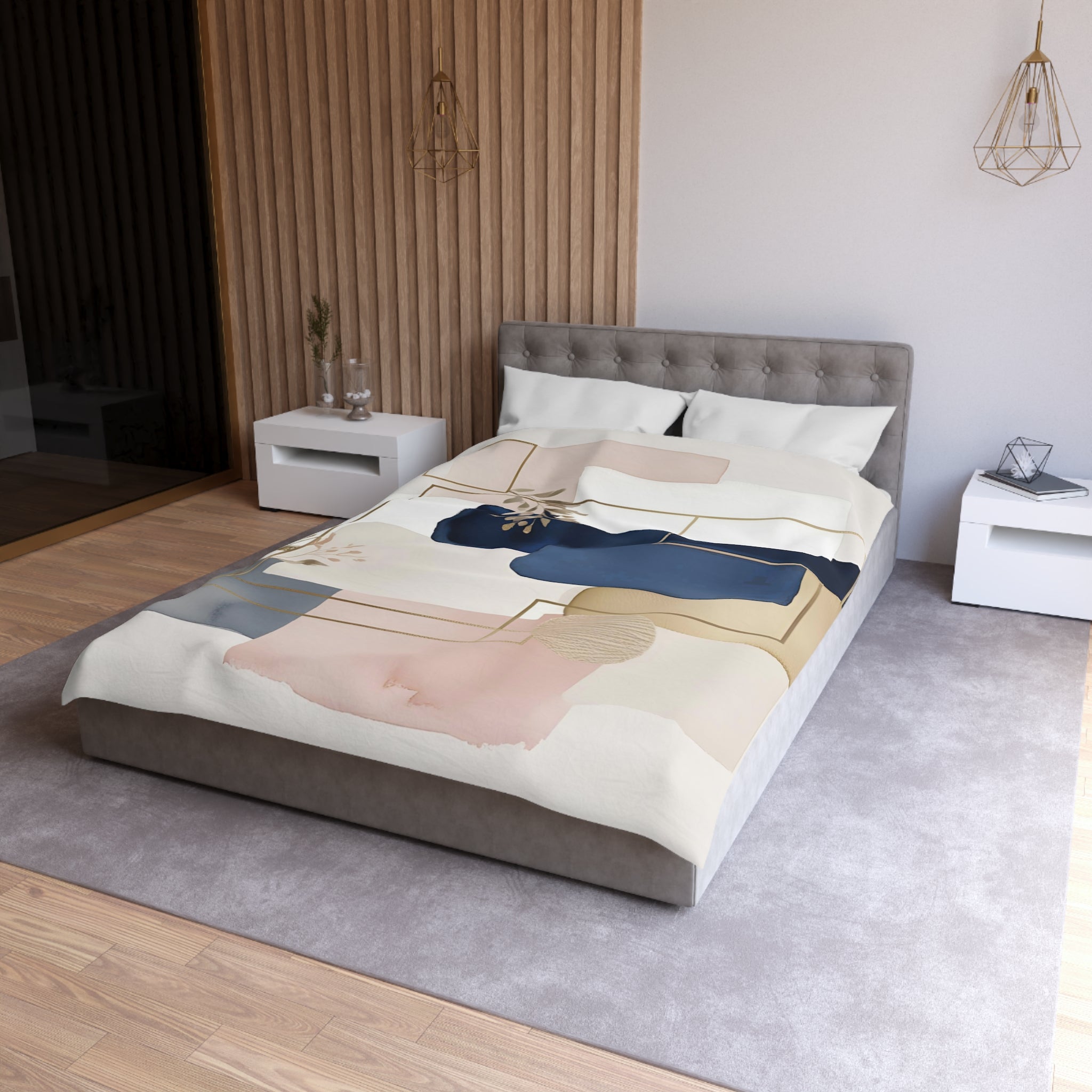 a modern bedroom with a gray tufted headboard, a white bedspread with abstract geometric patterns, and a gray area rug.