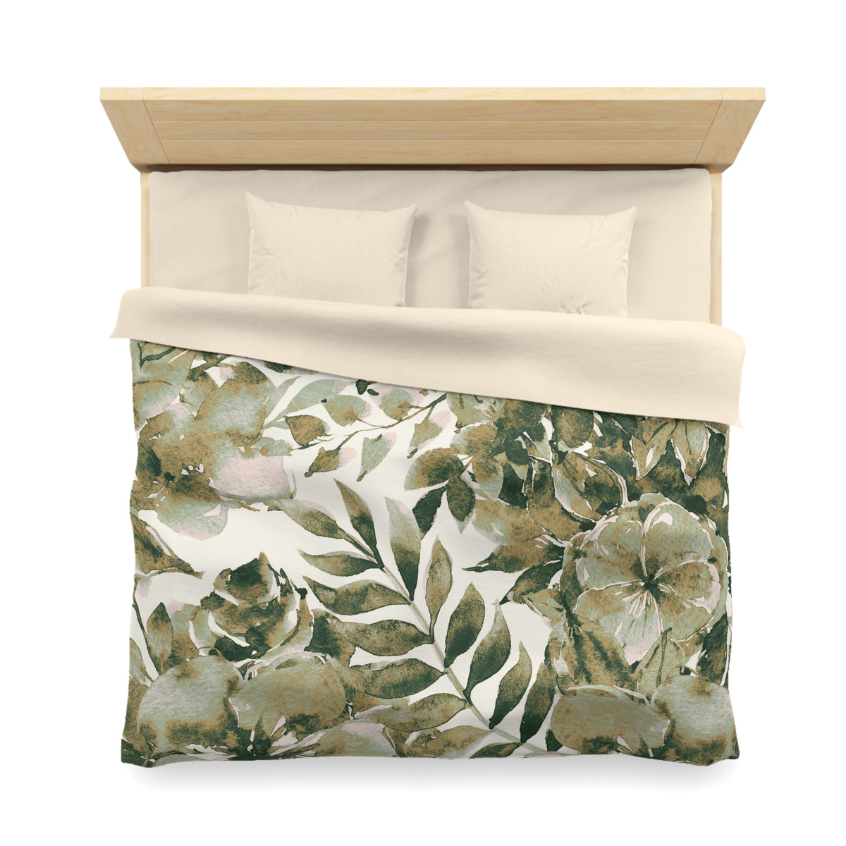 a neatly made bed with a floral print comforter and pillows.