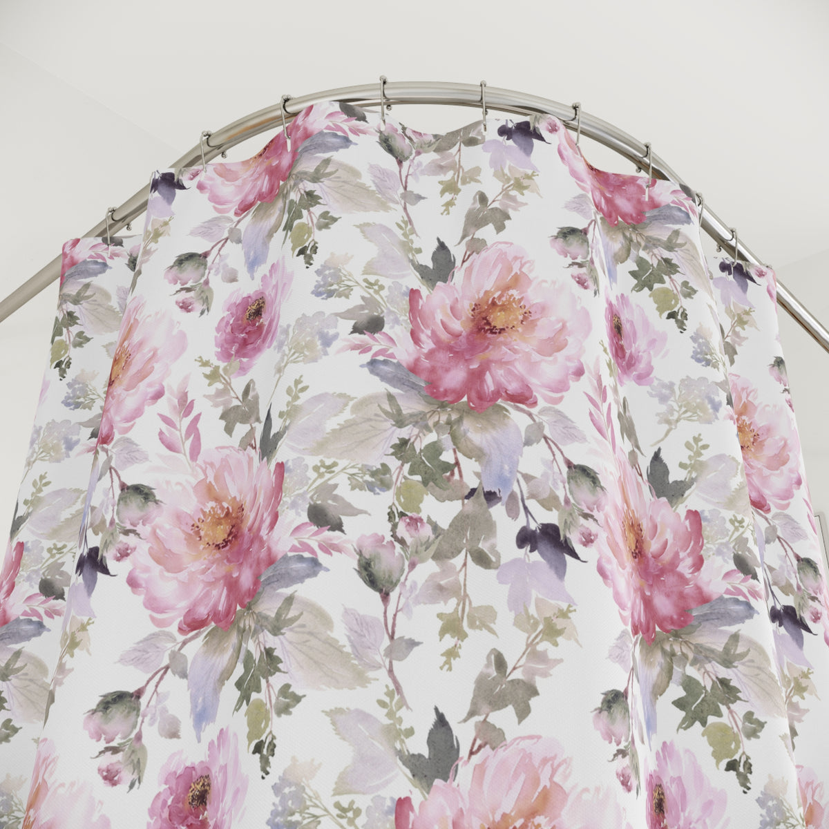 a shower curtain with a floral pattern of pink and green flowers.