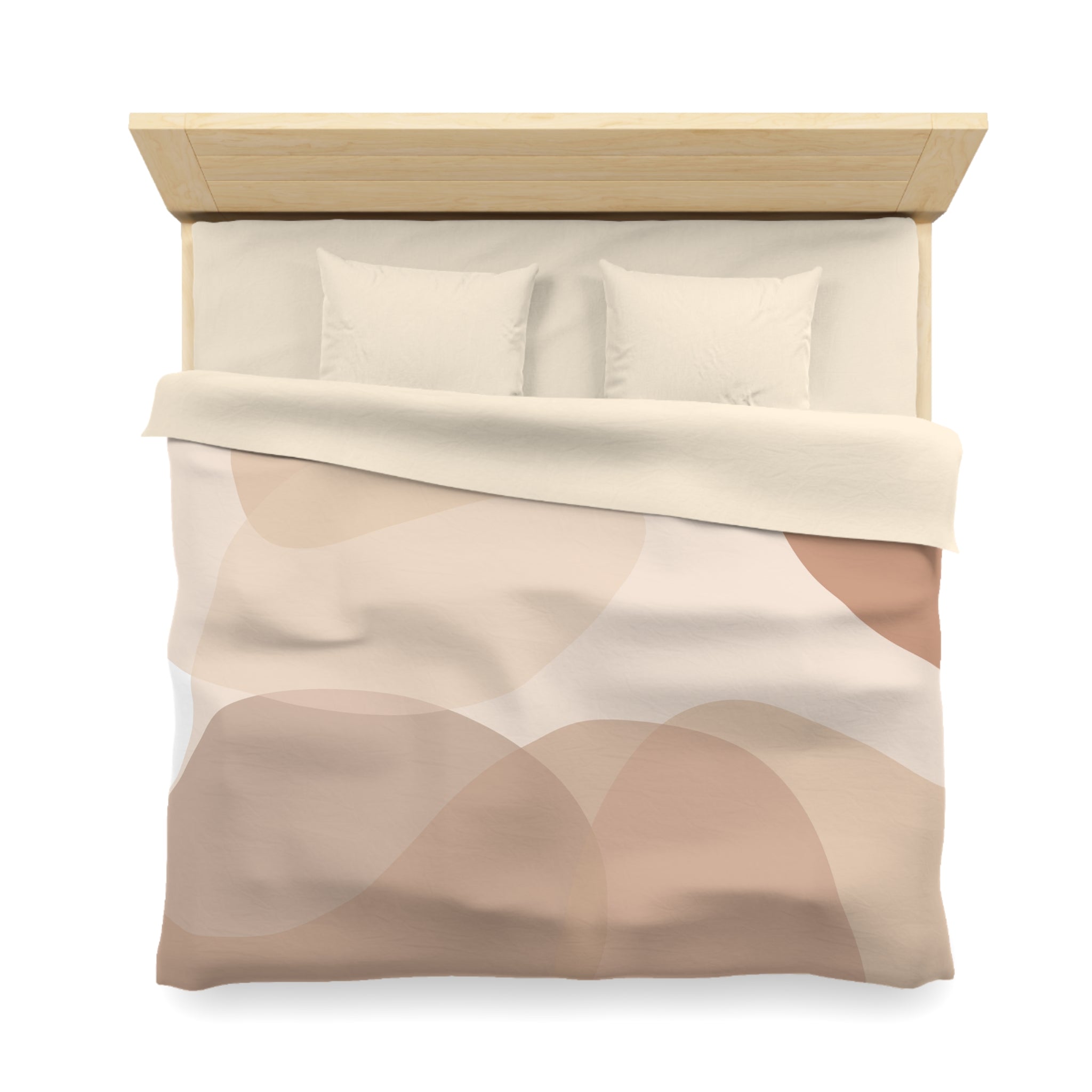 A neatly made bed with a beige and brown patterned comforter and two white pillows.