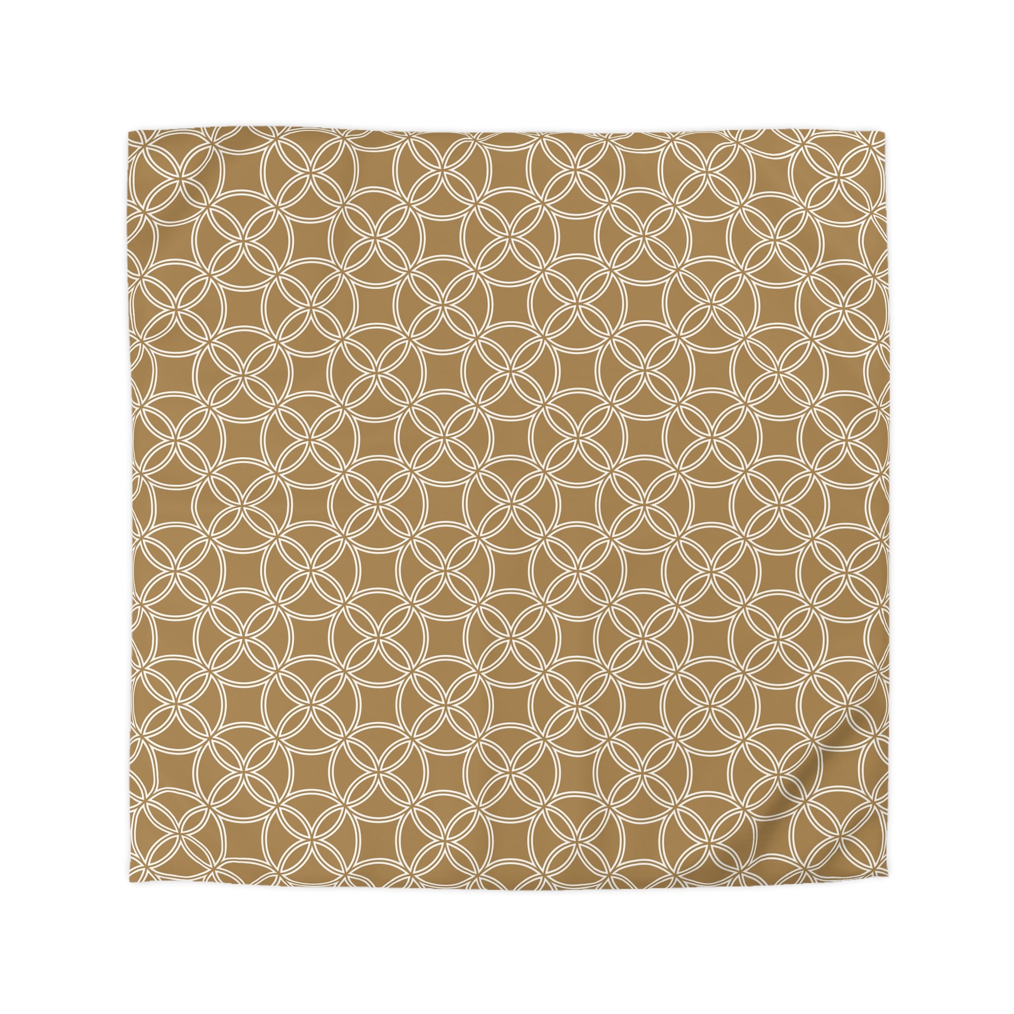 a square-shaped fabric with a repeating pattern of white circles on a brown background.