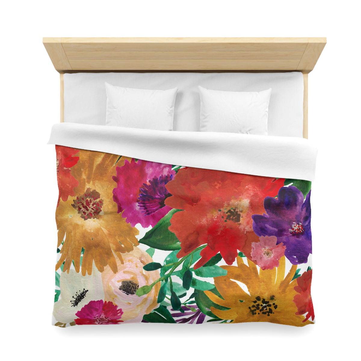 a bed with a colorful floral print duvet cover featuring a variety of flowers in different colors, including red, orange, yellow, and purple.