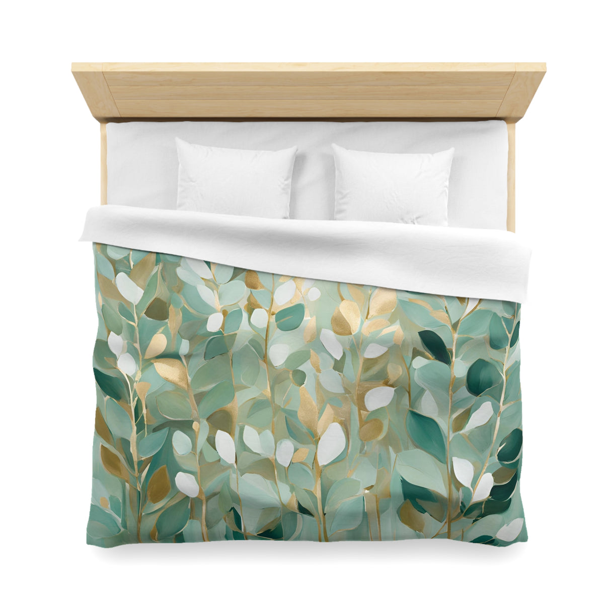 a neatly made bed with a green and white leafy patterned comforter and two white pillows.