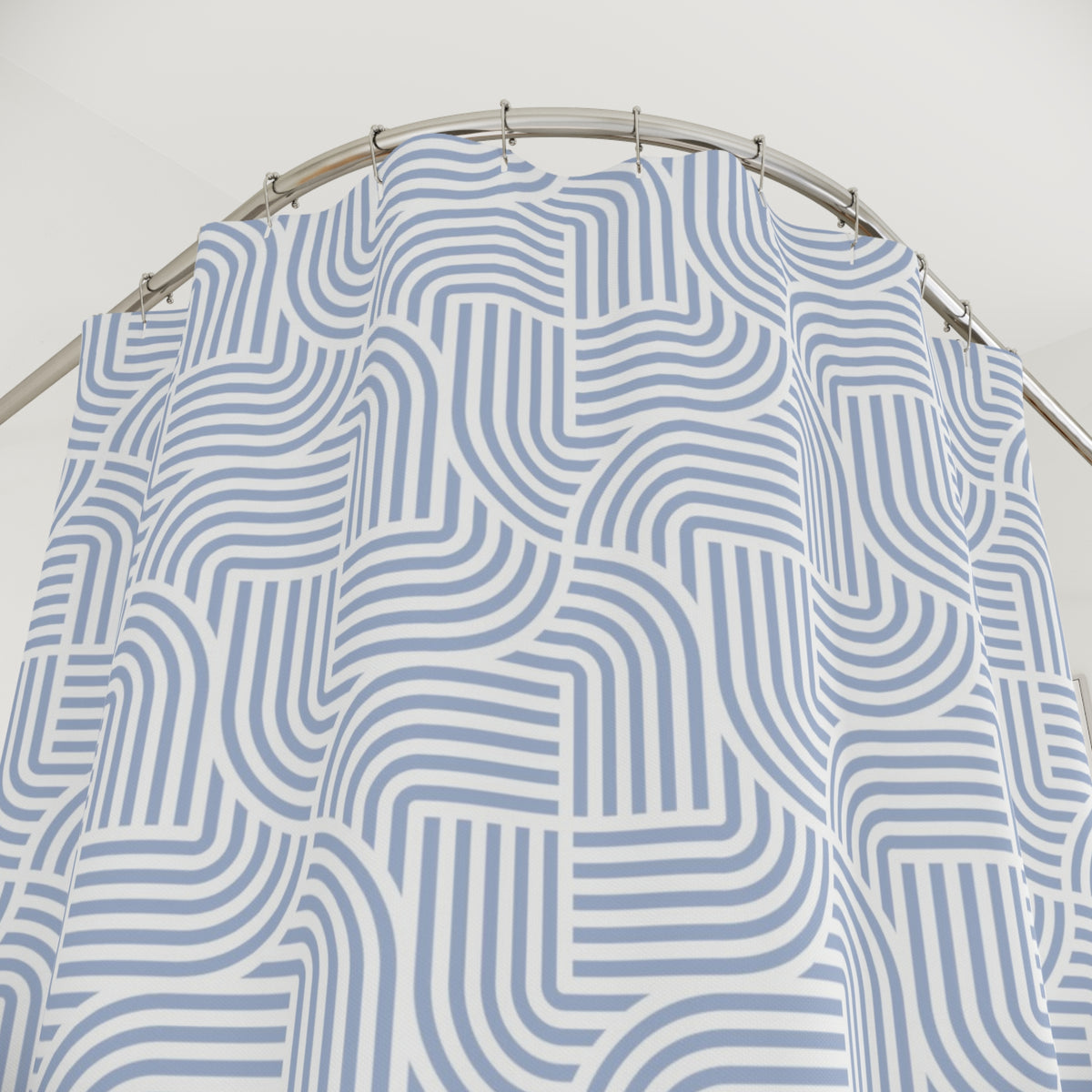 a shower curtain with a repeating pattern of blue and white stripes.