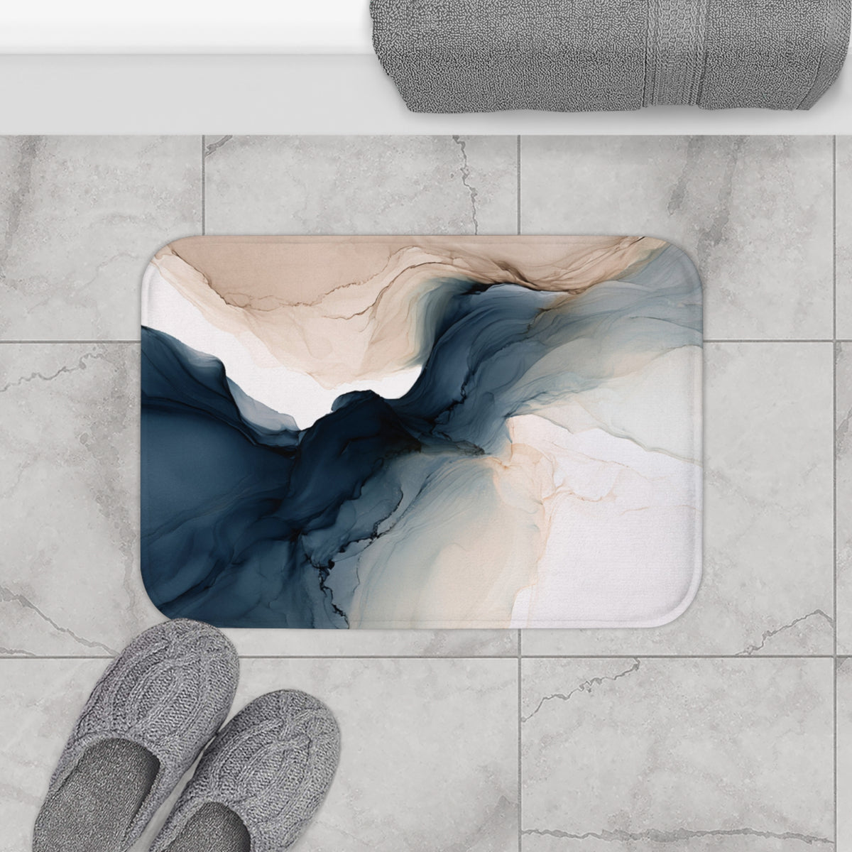a bathroom rug with a marble pattern and a pair of slippers