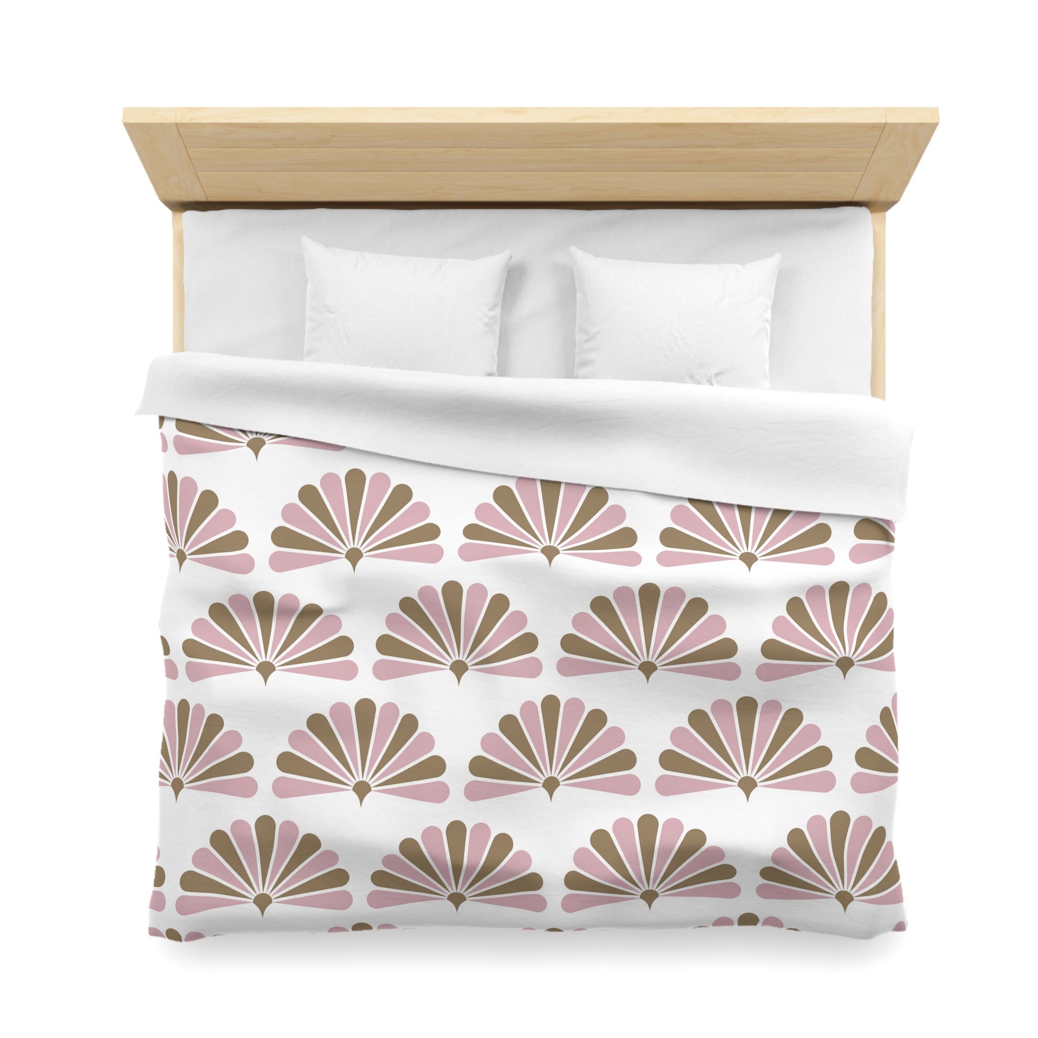 a neatly made bed with a white comforter and a patterned blanket featuring a repeating design of pink and brown fan-like shapes.