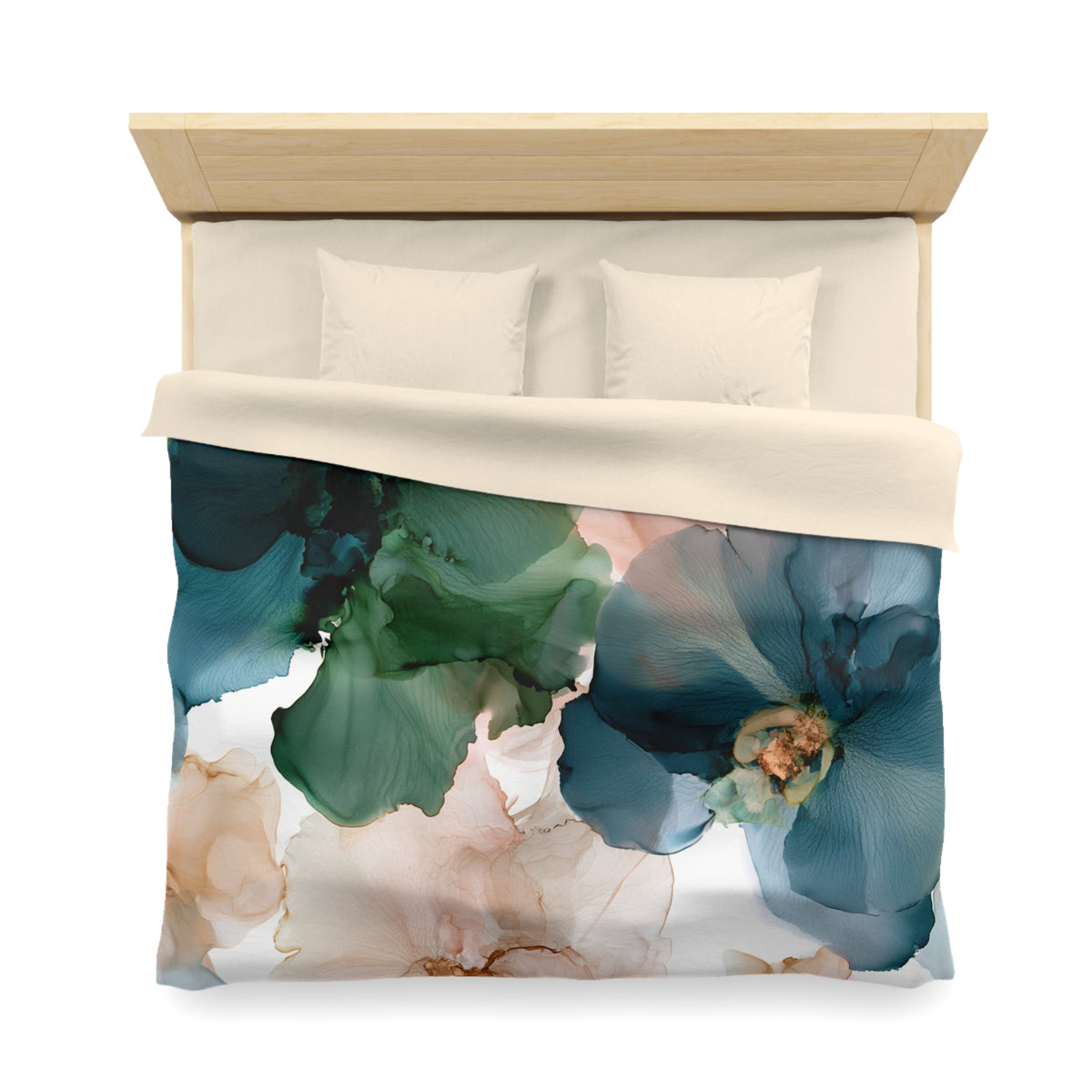 a bed with a blue and pink flower on it