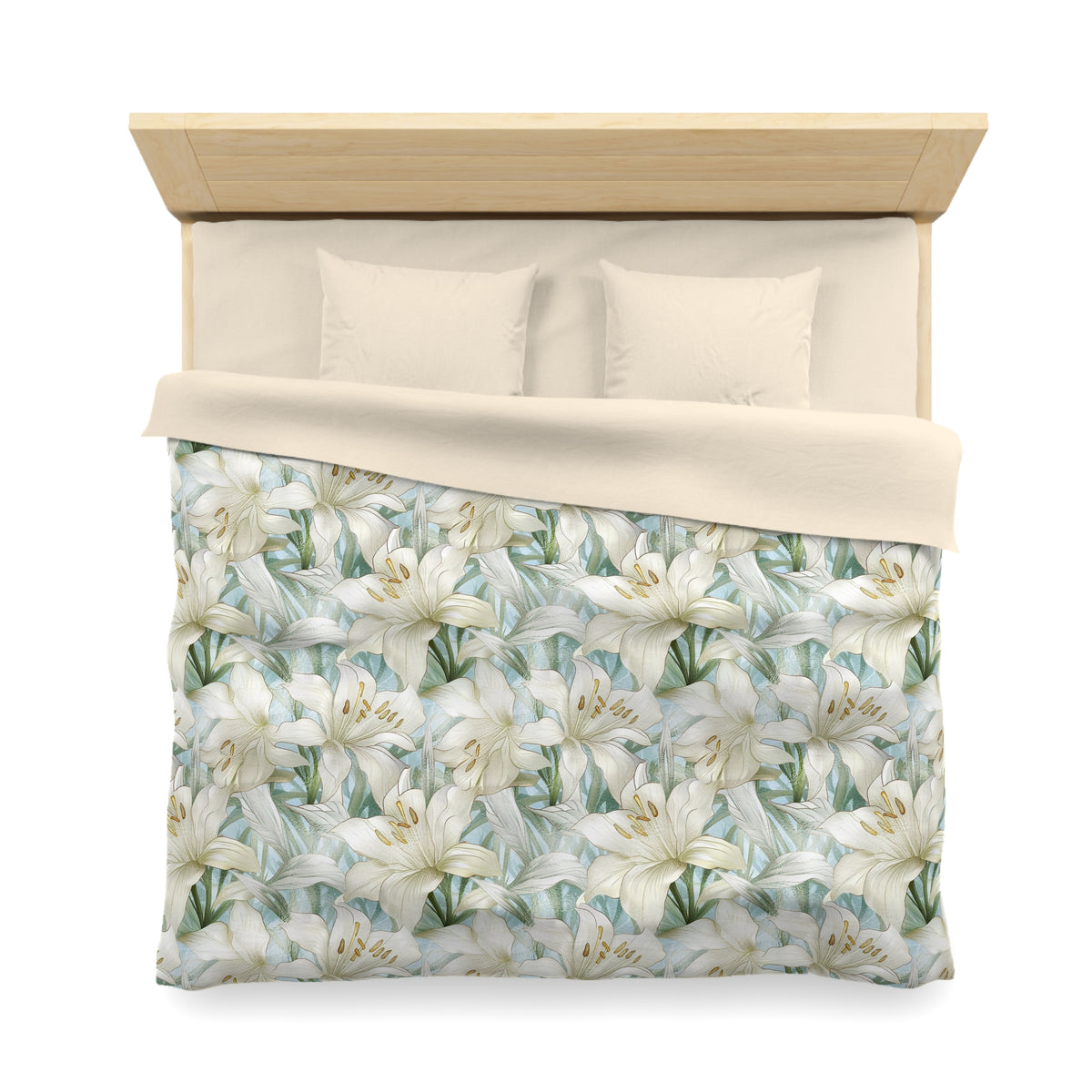 a neatly made bed with a floral print comforter and pillows.