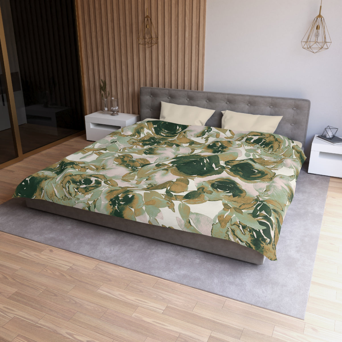 a modern bedroom with a large bed covered in a green and white floral comforter. The bed is positioned against a wall with a wooden panel. The room also features a nightstand, a pendant light, and a vase on a surface.
