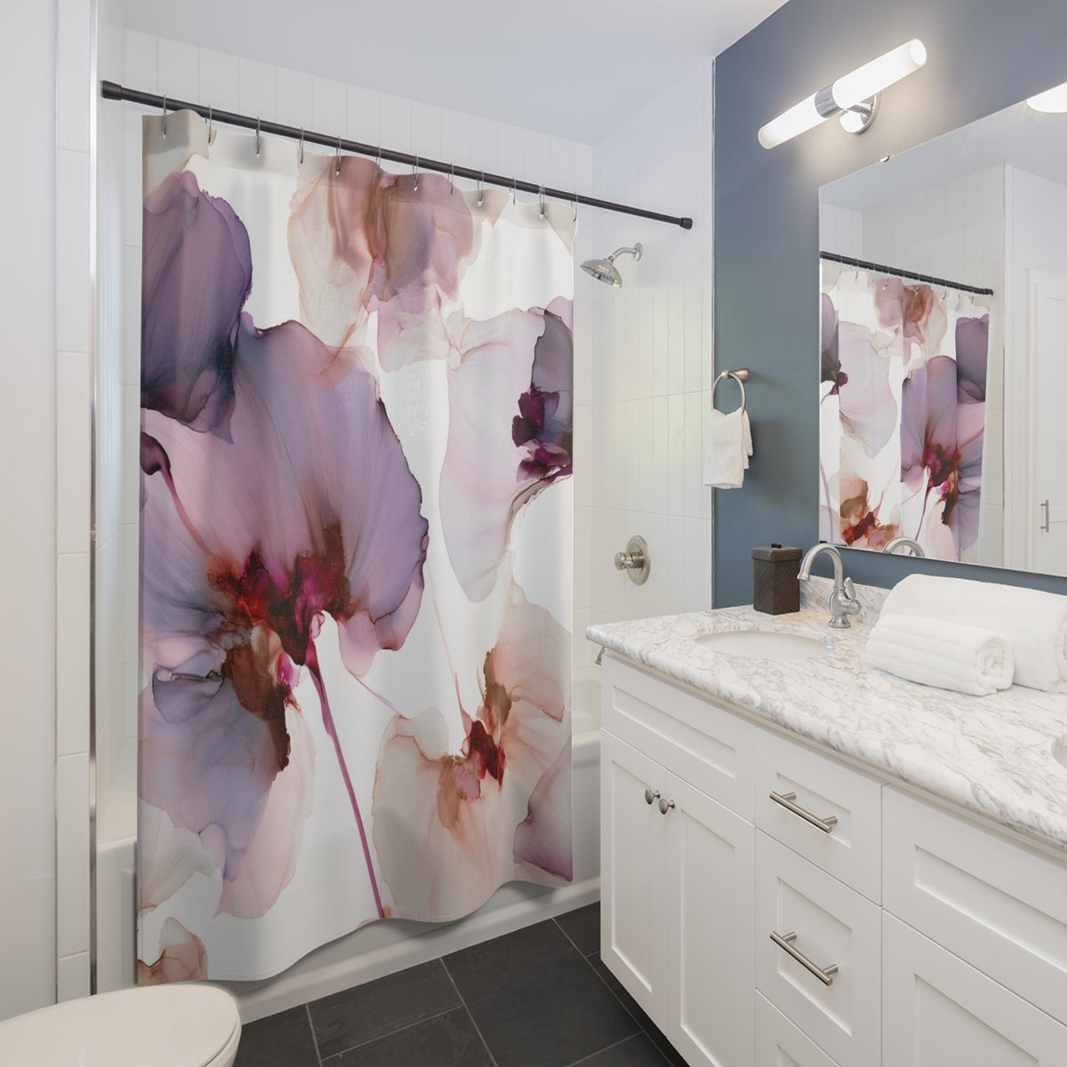 a modern bathroom with a white vanity, a large floral shower curtain, and a marble countertop.