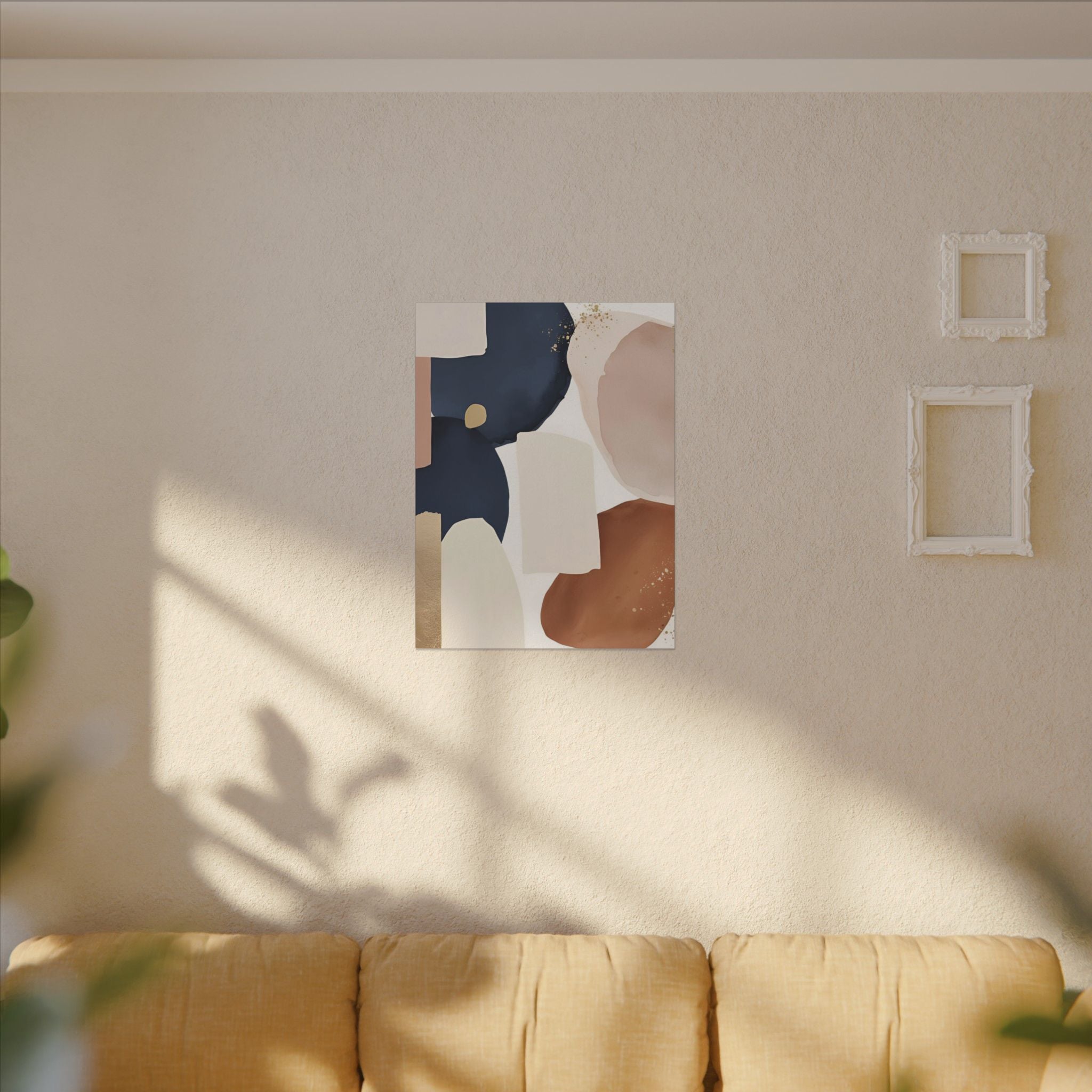 a living room with a beige sofa and a framed abstract art piece hanging on the wall above it.