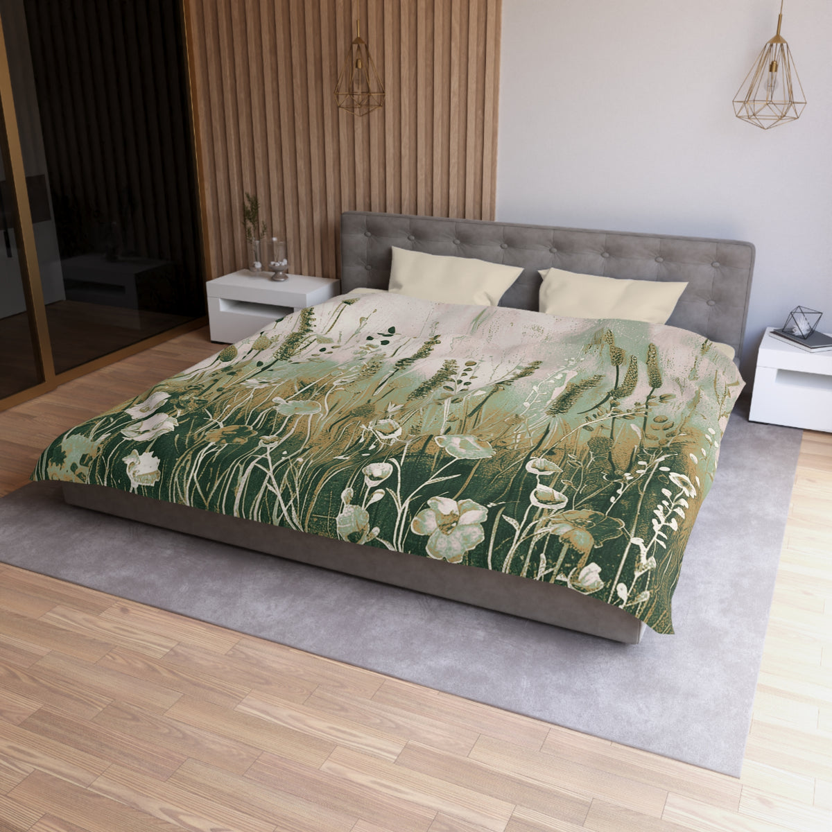 a bedroom with a large bed covered in a green and white floral comforter. The bed is positioned against a wall with a wooden panel. There are two nightstands on either side of the bed, and a pendant light hangs above it. The room has a wooden floor and a gray rug.