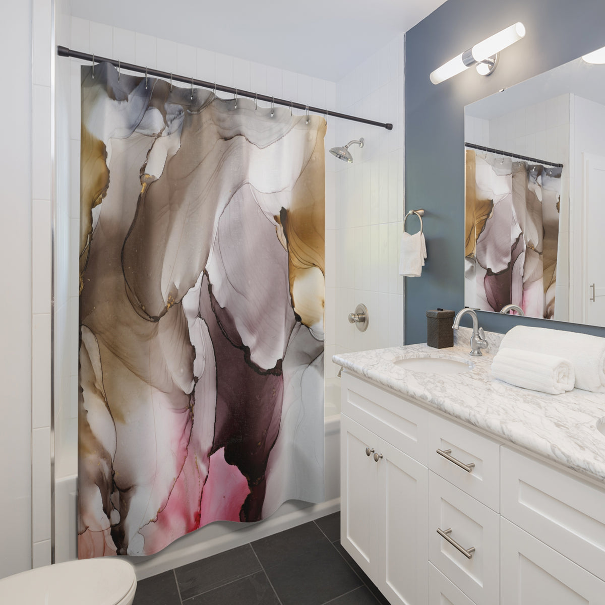 a modern bathroom with a white vanity, a large abstract shower curtain, and a marble countertop.