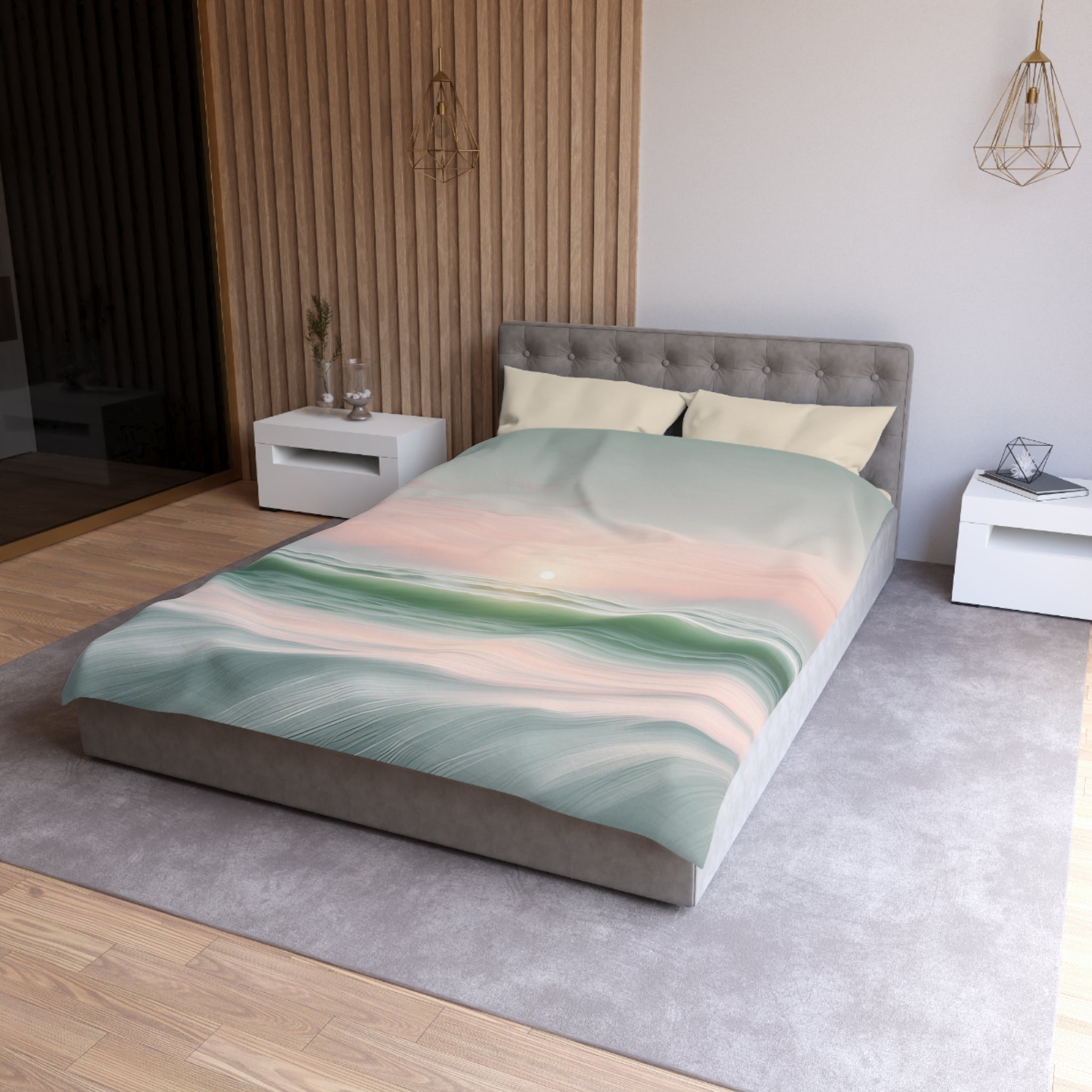 a modern bedroom with a large bed, a nightstand, and a pendant light. The bed has a colorful, abstract-patterned comforter and pillows. The room has a neutral color scheme with a gray carpet and white walls.