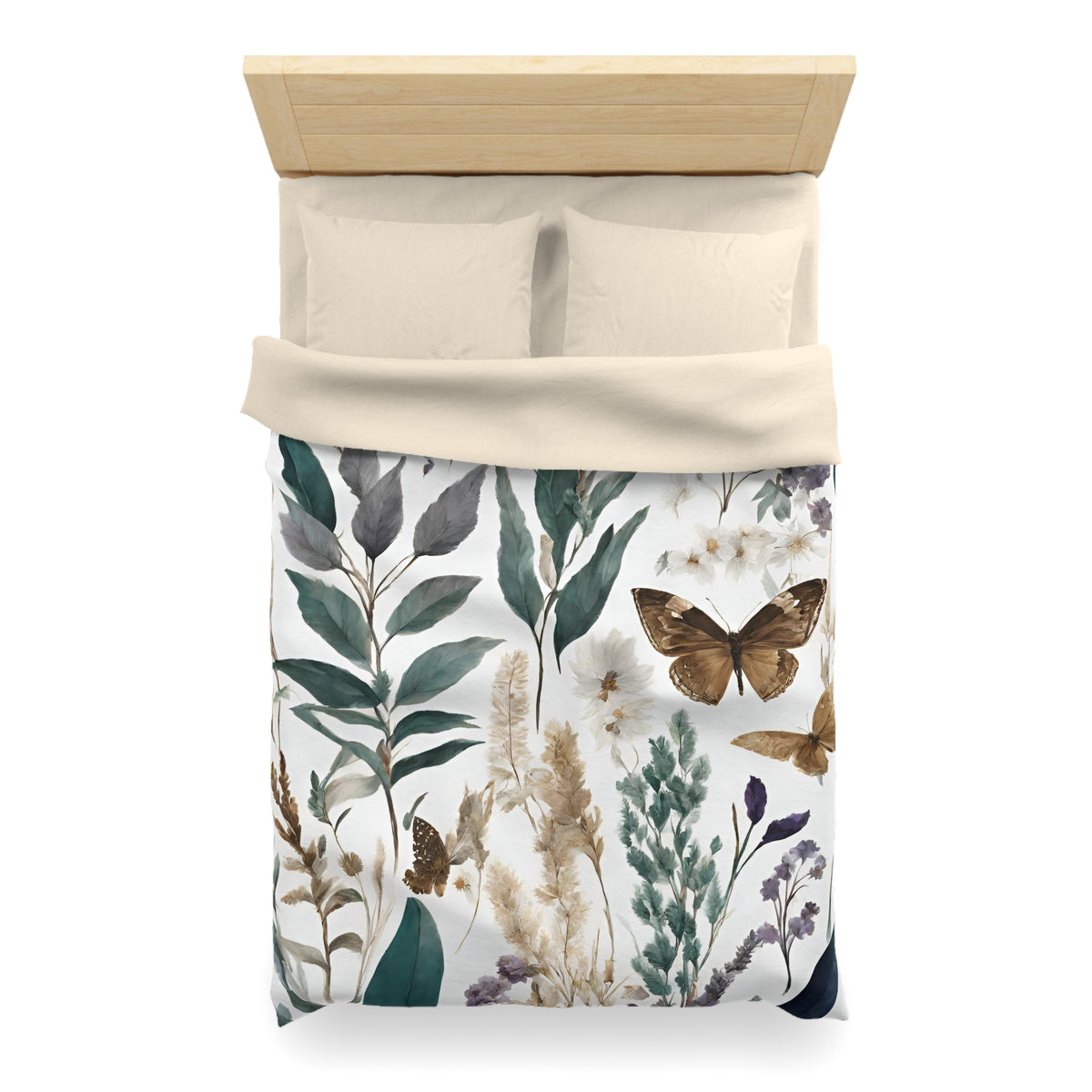 a bed with a white comforter and a floral print on the bedspread.