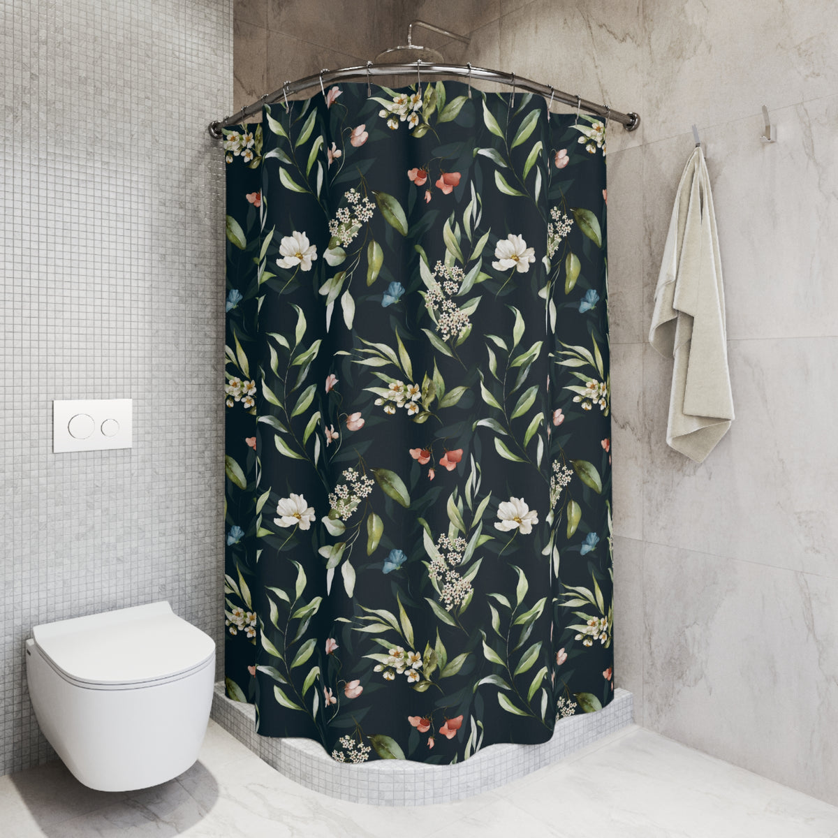 a bathroom with a shower curtain adorned with a floral pattern in shades of green and white. The shower curtain is hanging from a rod next to a towel. The bathroom also includes a toilet and a sink.