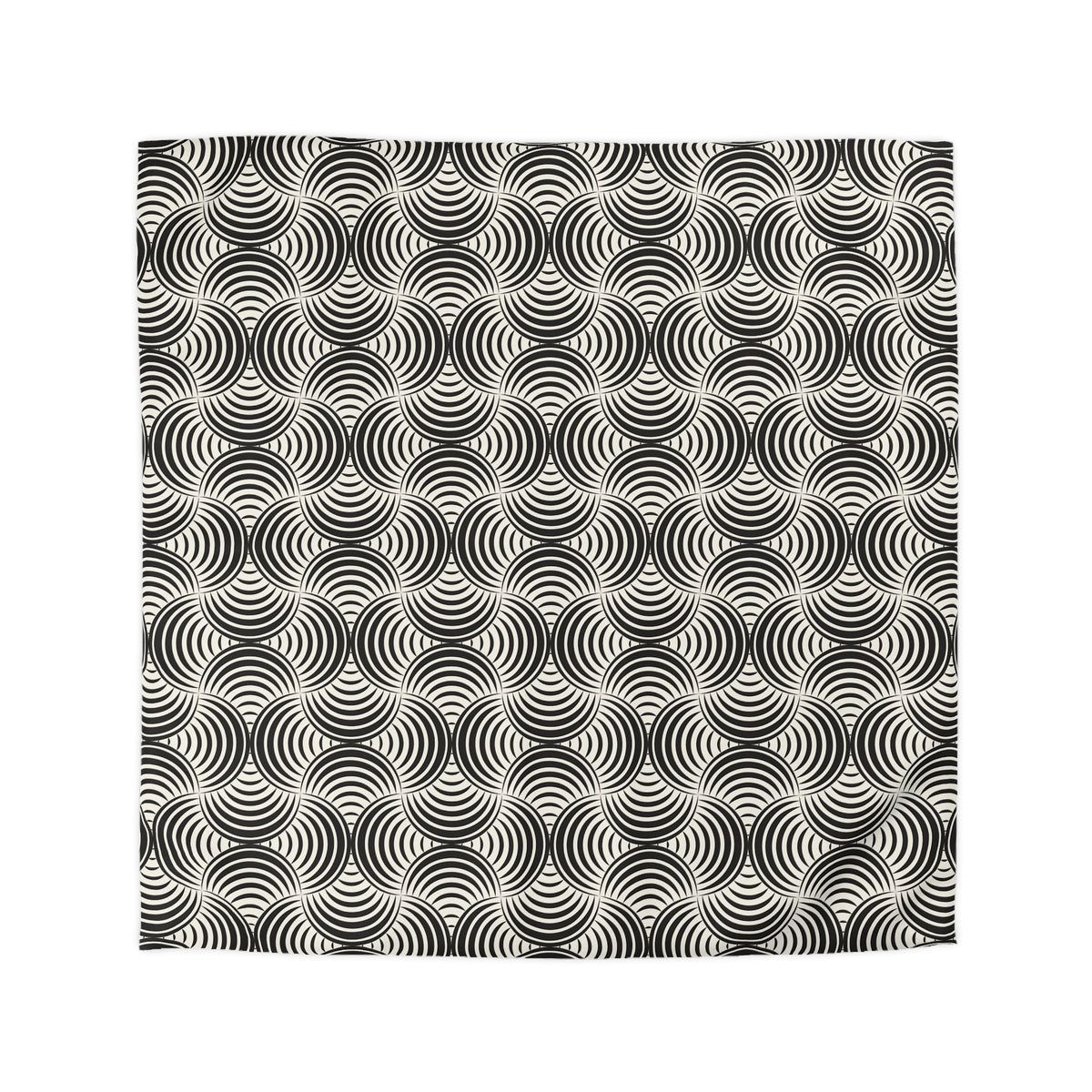 a repeating pattern of black and white circles or swirls, creating a visually striking and symmetrical design.