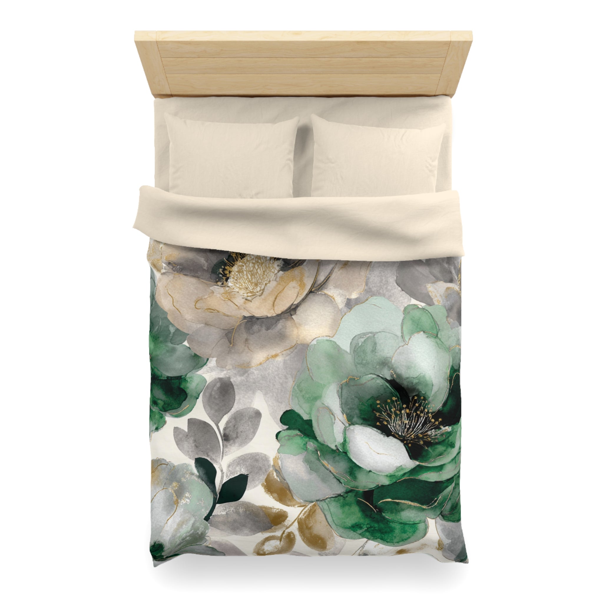 a bed with a floral print duvet cover featuring a combination of green and gray flowers, along with leaves. The duvet cover is spread out on the bed, and there are two pillows placed on top of it.