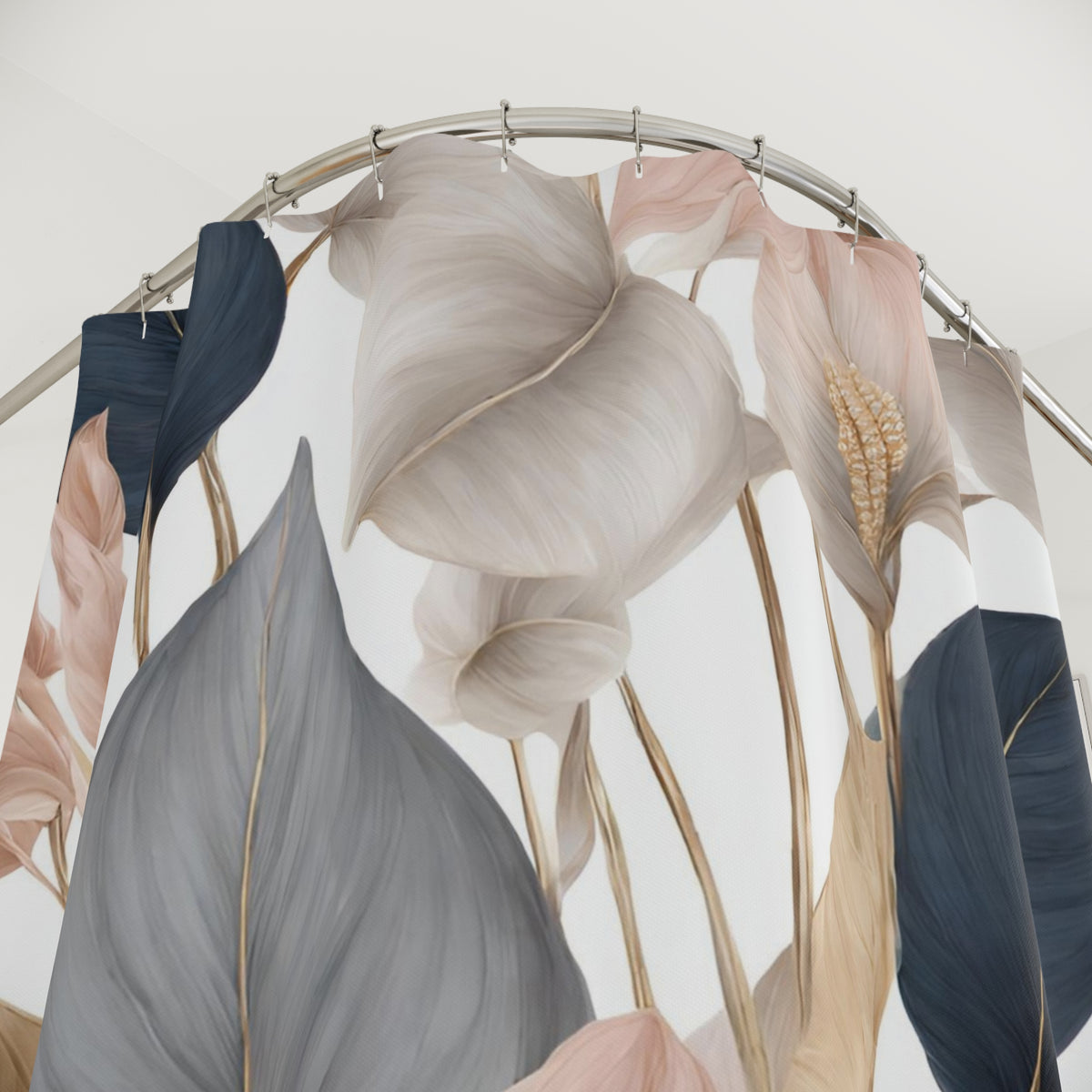 a shower curtain with a floral pattern, including leaves and flowers in shades of pink, blue, and gray.