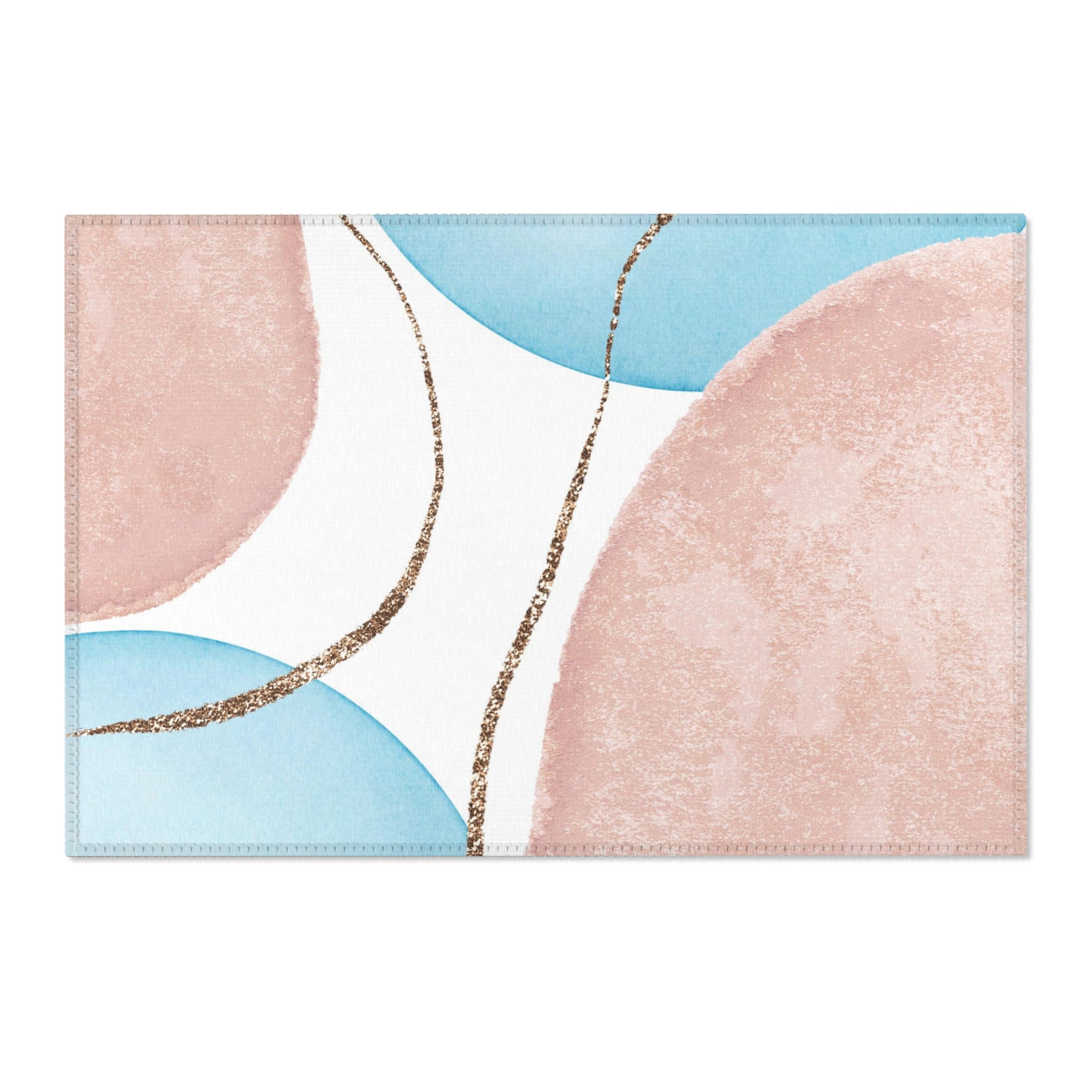 Modern blush pink and sky blue abstract boho rectangle area rug styled in a modern living room